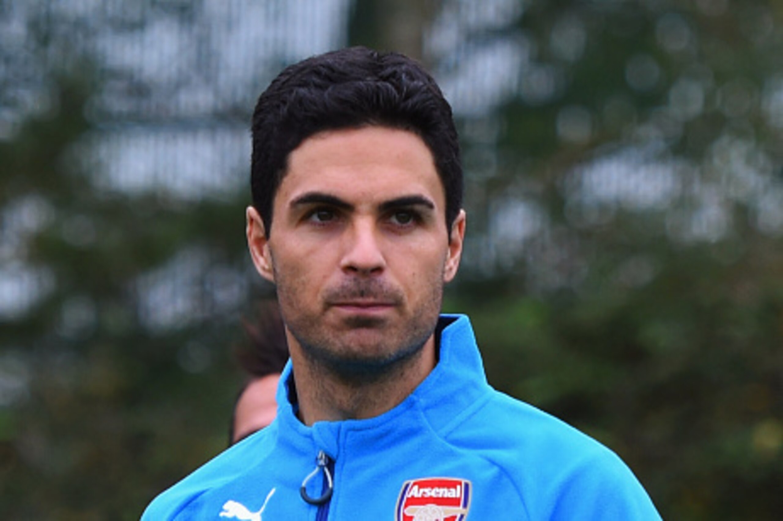 ST ALBANS, ENGLAND - NOVEMBER 03:  Mikel Arteta looks on during an Arsenal training session ahead of the UEFA Champions League match against RSC Anderlecht at London Colney on November 3, 2014 in St Albans, England.  (Photo by Michael Regan/Getty Images)