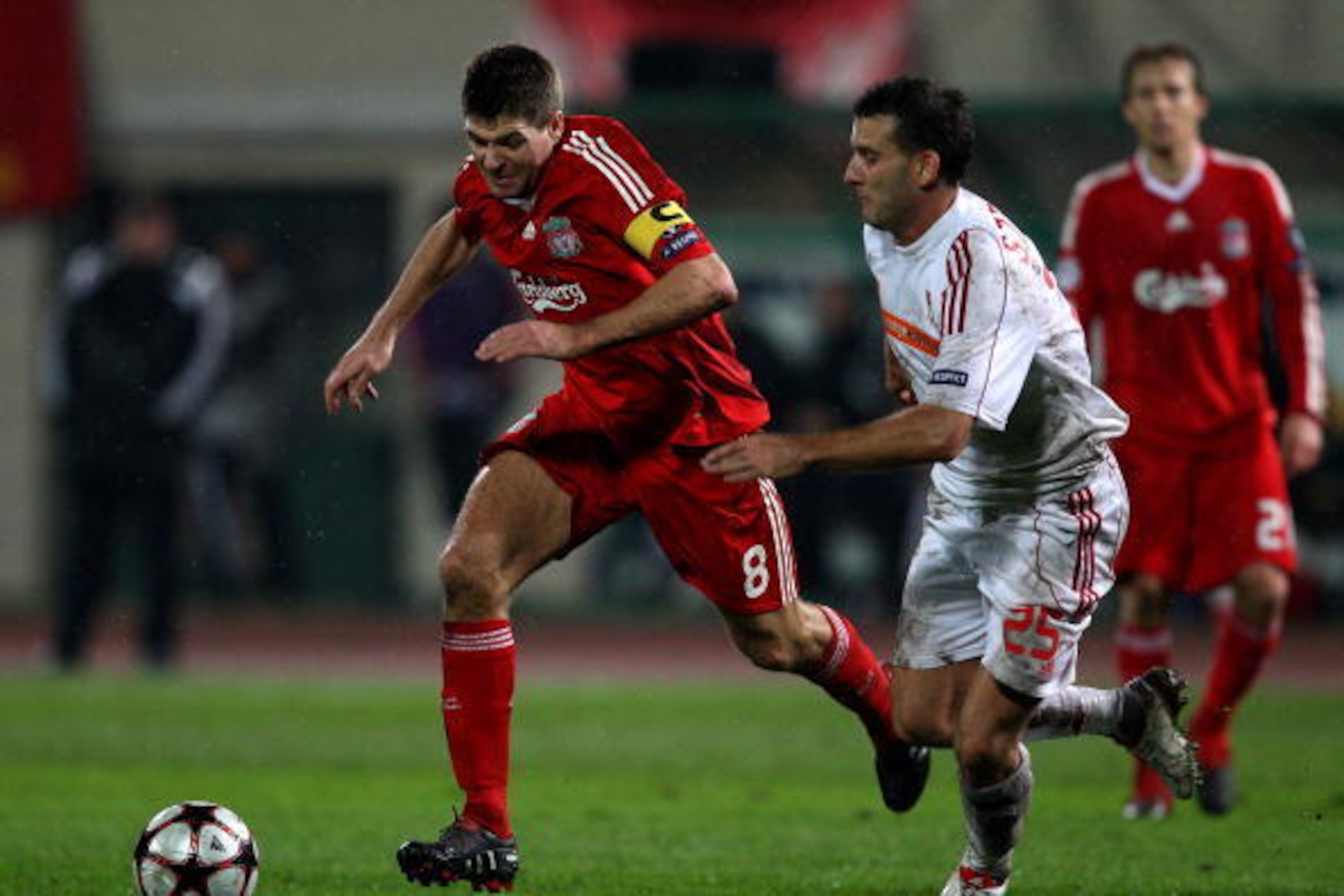 BUDAPEST, HUNGARY - NOVEMBER 24: Steven Gerrard of Liverpool goes around Zoltan Szelesi during the UEFA Champions League group E match between Debrecen and Liverpool at the Ferenc Puskas Stadium on November 24, 2009 in Budapest, Hungary. (Photo by Richa BUDAPEST, HUNGARY - NOVEMBER 24: Steven Gerrard of Liverpool goes around Zoltan Szelesi during the UEFA Champions League group E match between Debrecen and Liverpool at the Ferenc Puskas Stadium on November 24, 2009 in Budapest, Hungary. (Photo by Richa