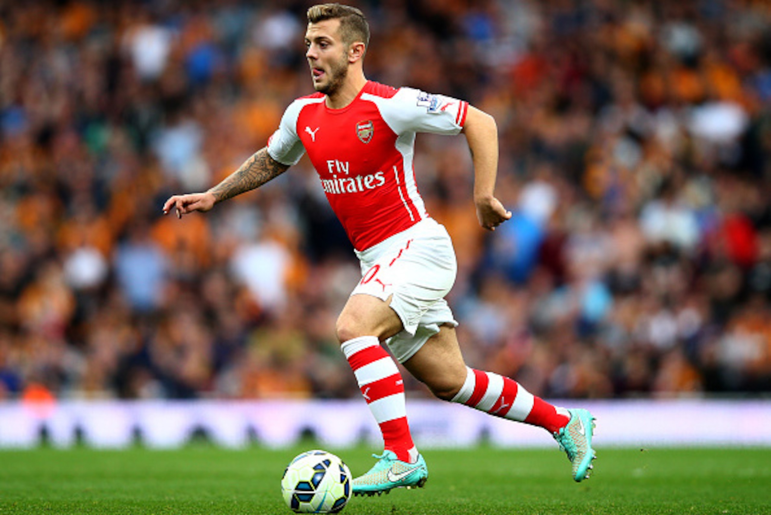 LONDON, ENGLAND - OCTOBER 18:  Jack Wilshere of Arsenal in action during the Barclays Premier League match between Arsenal and Hull City at Emirates Stadium on October 18, 2014 in London, England.  (Photo by Clive Rose/Getty Images)
