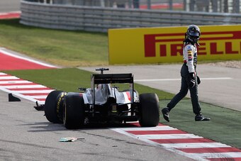 AUSTIN, TX - NOVEMBER 02:  Adrian Sutil of Germany and Sauber F1 gets out of his car after crashing during the United States Formula One Grand Prix at Circuit of The Americas on November 2, 2014 in Austin, United States.  (Photo by Clive Mason/Getty Image