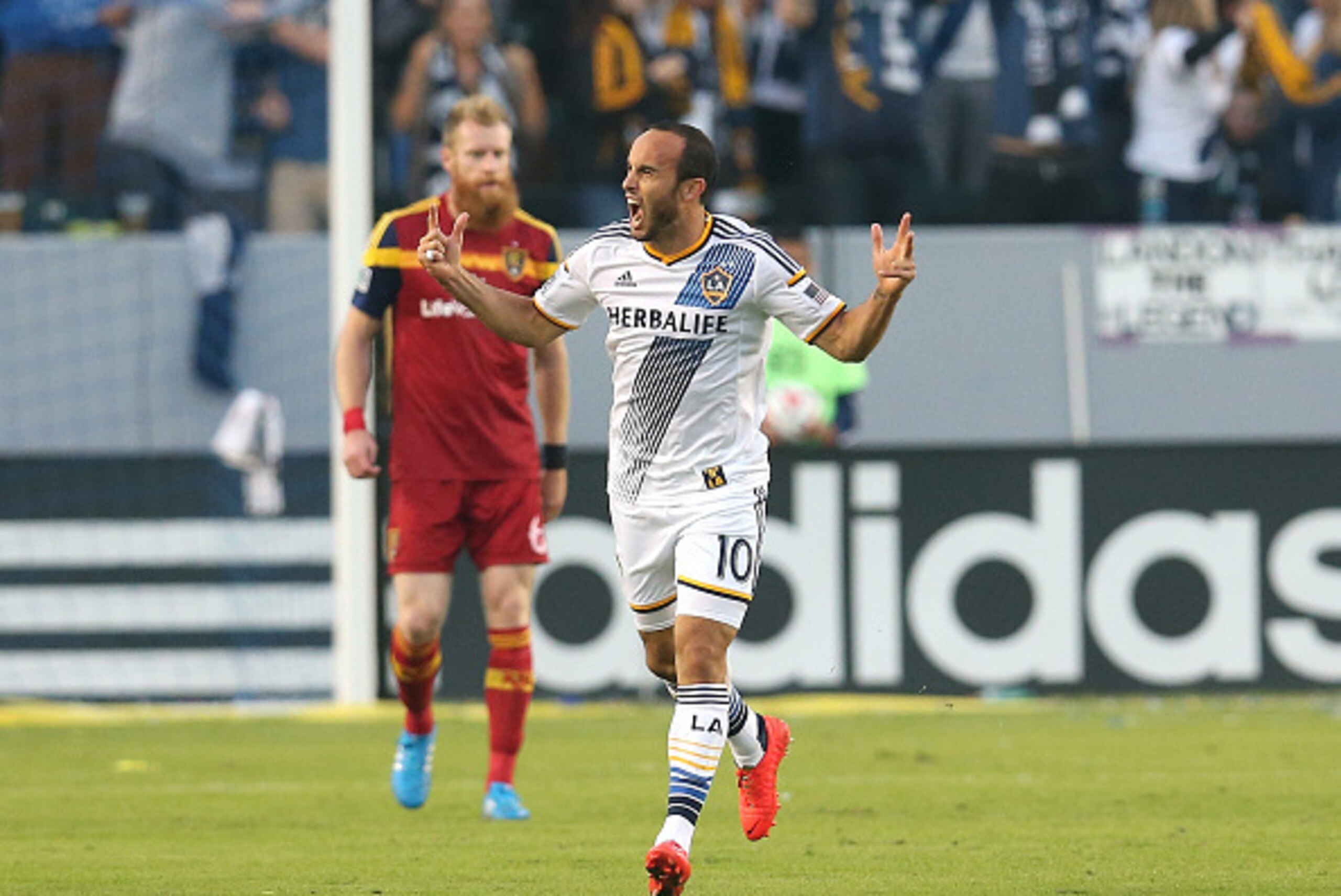 LOS ANGELES, CA - NOVEMBER 09:  Landon Donovan  #10 of the Los Angeles Galaxy celebrates as he returns to midfield after scoring the Galaxy's first goal against Real Salt Lake in Leg 2 of the Western Conference Semifinals at StubHub Center on November 9, 