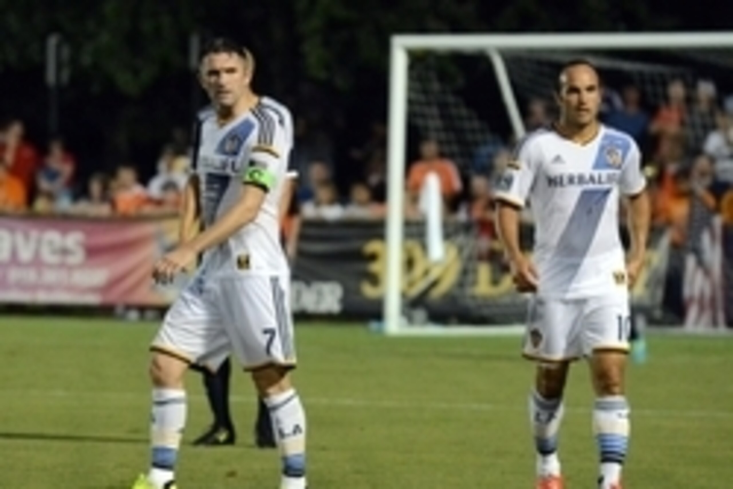 Jun 24, 2014; Cary, NC, USA;  Los Angeles Galaxy forward Robbie Keane (7) and forward Landon Donovan (10) during the second half of the US Open Cup fifth round at WakeMed Soccer Park. Mandatory Credit: Rob Kinnan-USA TODAY Sports