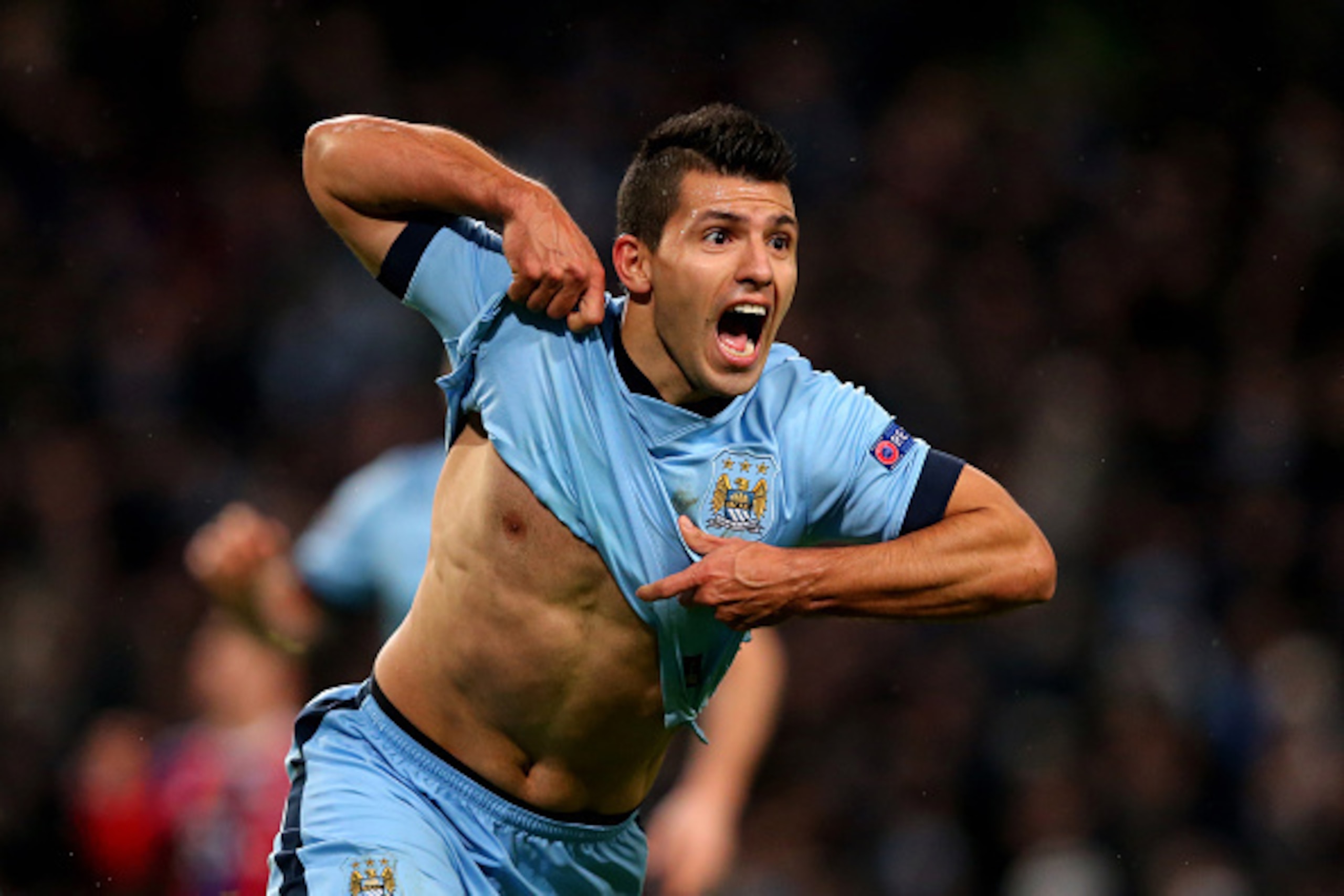 MANCHESTER, ENGLAND - NOVEMBER 25:  Sergio Aguero of Manchester City celebrates after scoring his team's third and matchwinning goal during the UEFA Champions League Group E match between Manchester City and FC Bayern Muenchen at the Etihad Stadium on Nov