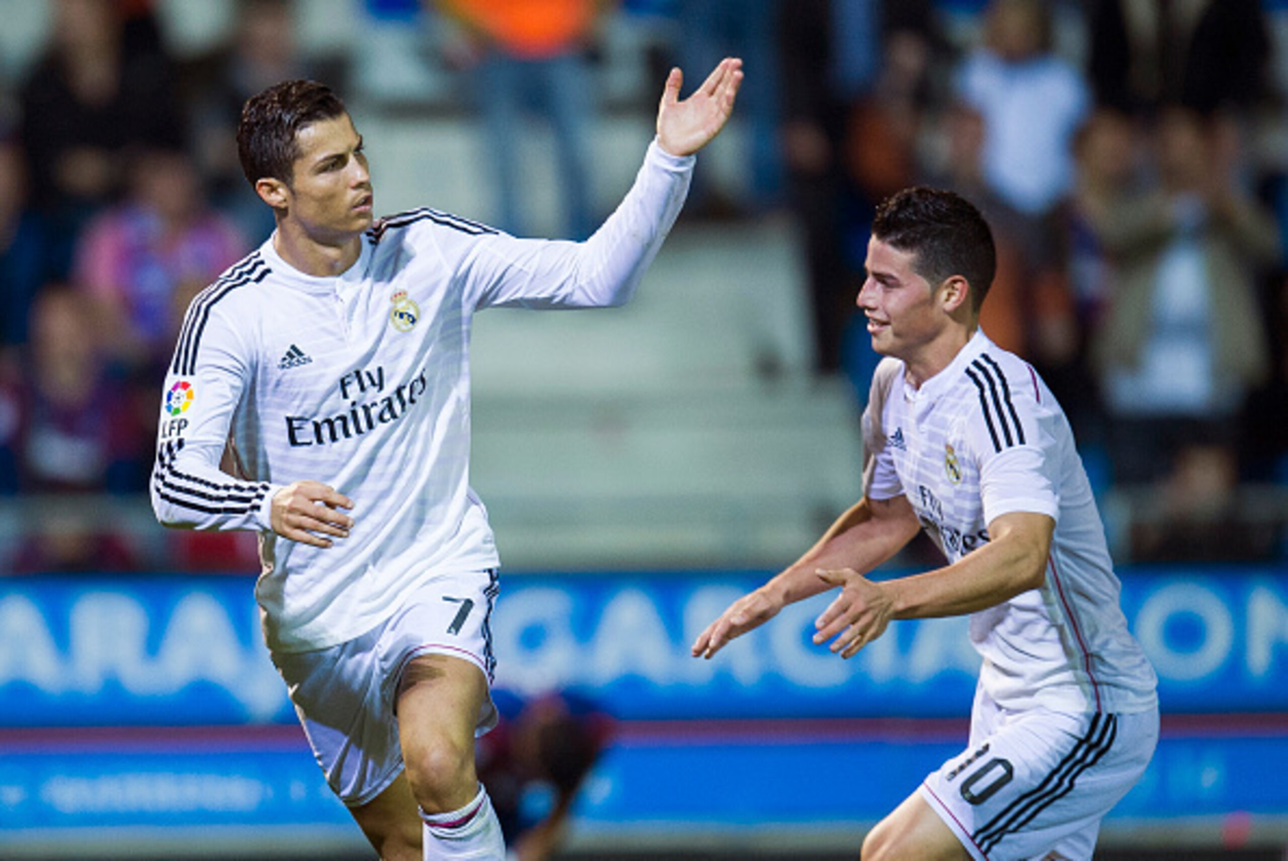 EIBAR, SPAIN - NOVEMBER 22:  Cristiano Ronaldo (L) of Real Madrid celebrates after scoring during the La Liga match betweenÊSD Eibar andÊReal Madrid at Ipurua Municipal Stadium on November 22, 2014 in Eibar, Spain.  (Photo by Juan Manuel Serrano Arce/Gett