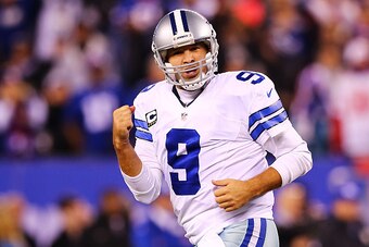 EAST RUTHERFORD, NJ - NOVEMBER 23:  Tony Romo #9 of the Dallas Cowboys celebrates throwing the game winning touchdown pass in the fourth quarter against the New York Giants at MetLife Stadium on November 23, 2014 in East Rutherford, New Jersey. The Cowboy