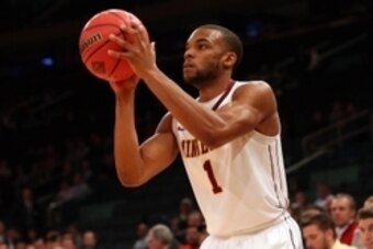Nov 26, 2014; New York, NY, USA; Minnesota Golden Gophers guard Andre Hollins (1) shoots for three during the first half against the St. John's Red Storm at Madison Square Garden. Mandatory Credit: Anthony Gruppuso-USA TODAY Sports