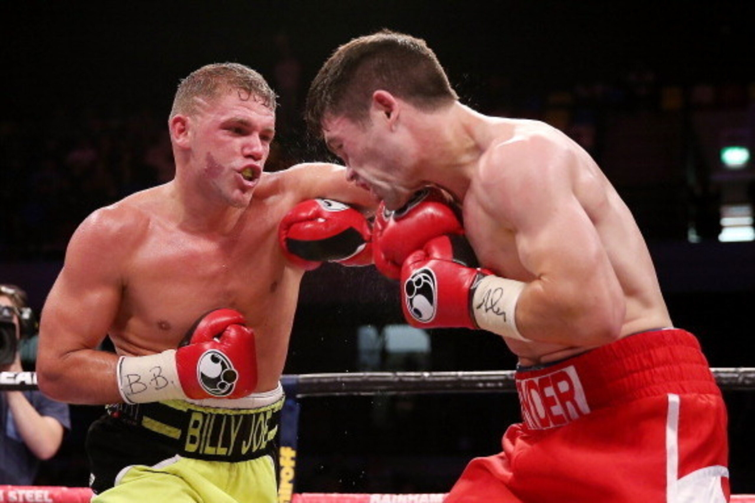 LONDON, ENGLAND - SEPTEMBER 21:  Billy Joe Saunders (L) in action with John Ryder during their British and Commonwealth Middleweight Championship bout at The Copper Box on September 21, 2013 in London, England.  (Photo by Scott Heavey/Getty Images)