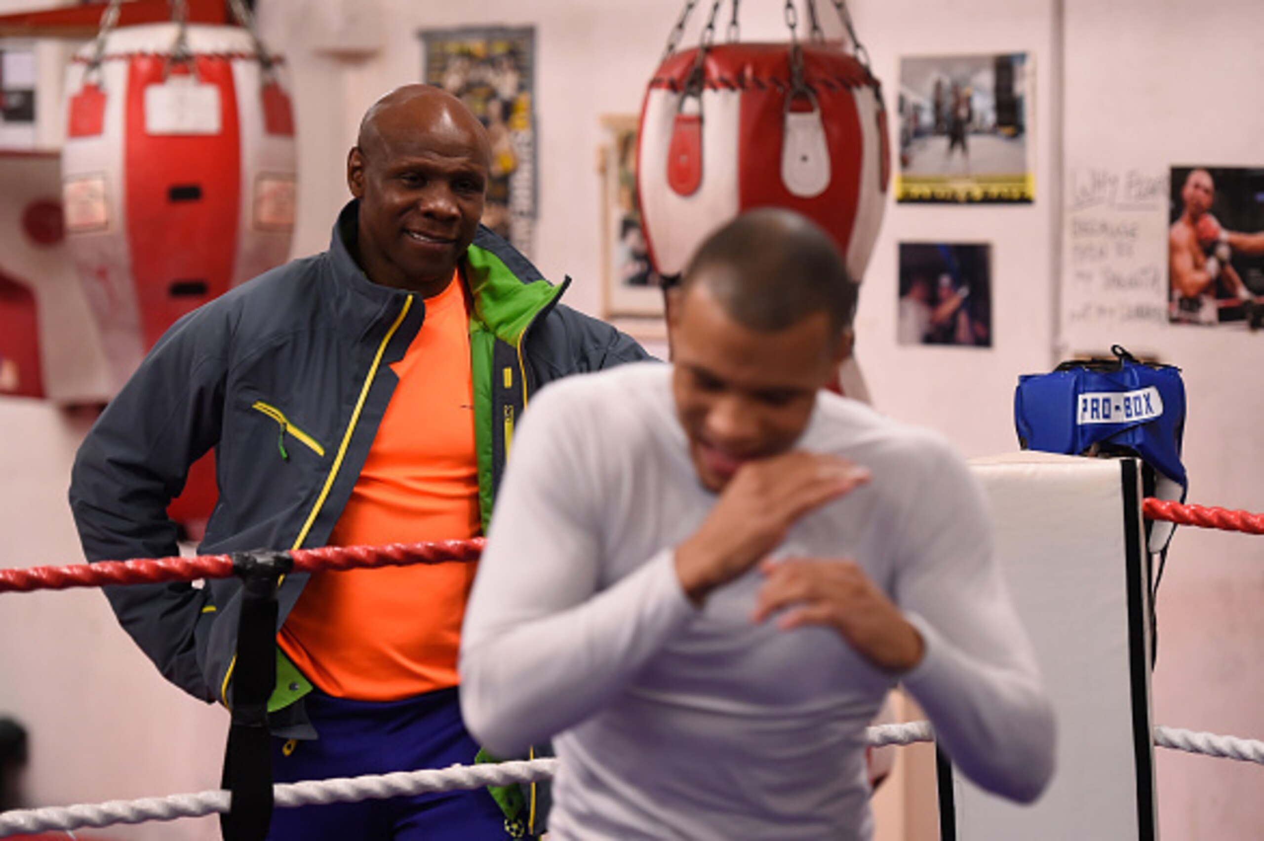 BRIGHTON, ENGLAND - NOVEMBER 14:  Proud father and manager Chris Eubank watches as his son Chris Eubank Jnr shadow boxes during a training session at the Brighton and Hove Boxing Club on November 14, 2014 in Brighton, England.  (Photo by Mike Hewitt/Getty
