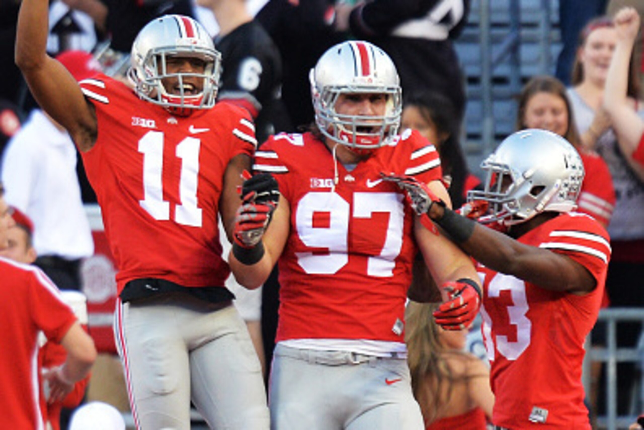 COLUMBUS, OH - SEPTEMBER 27:  Joey Bosa #97 of the Ohio State Buckeyes celebrates after his sack of Gunner Kiel #11 of the Cincinnati Bearcats in the first quarter caused a fumble and safety at Ohio Stadium on September 27, 2014 in Columbus, Ohio. Celebra