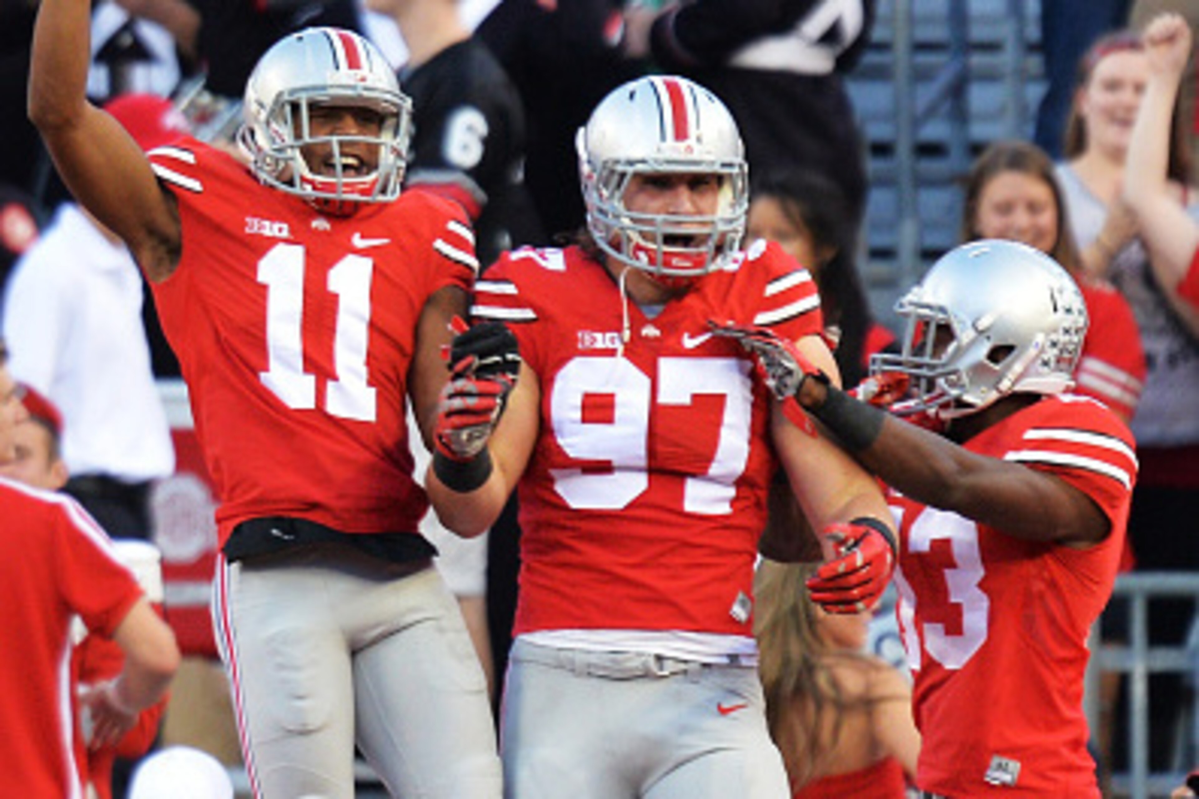 COLUMBUS, OH - SEPTEMBER 27:  Joey Bosa #97 of the Ohio State Buckeyes celebrates after his sack of Gunner Kiel #11 of the Cincinnati Bearcats in the first quarter caused a fumble and safety at Ohio Stadium on September 27, 2014 in Columbus, Ohio. Celebra