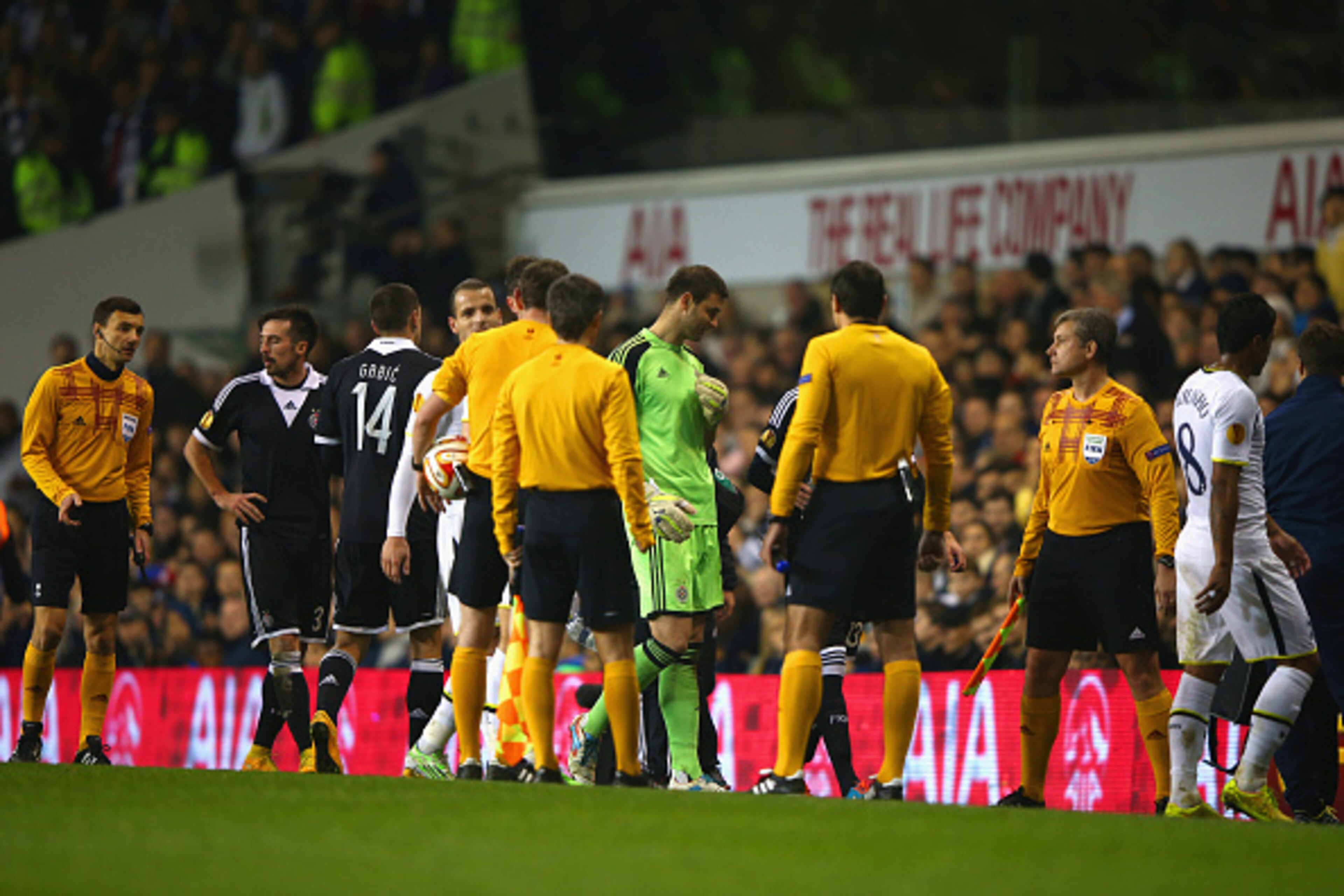 LONDON, ENGLAND - NOVEMBER 27:  Players and officials head down the tunnel as play is stopped due to a third pitch invader during the UEFA Europa League group C match between Tottenham Hotspur FC and FK Partizan at White Hart Lane on November 27, 2014 in 