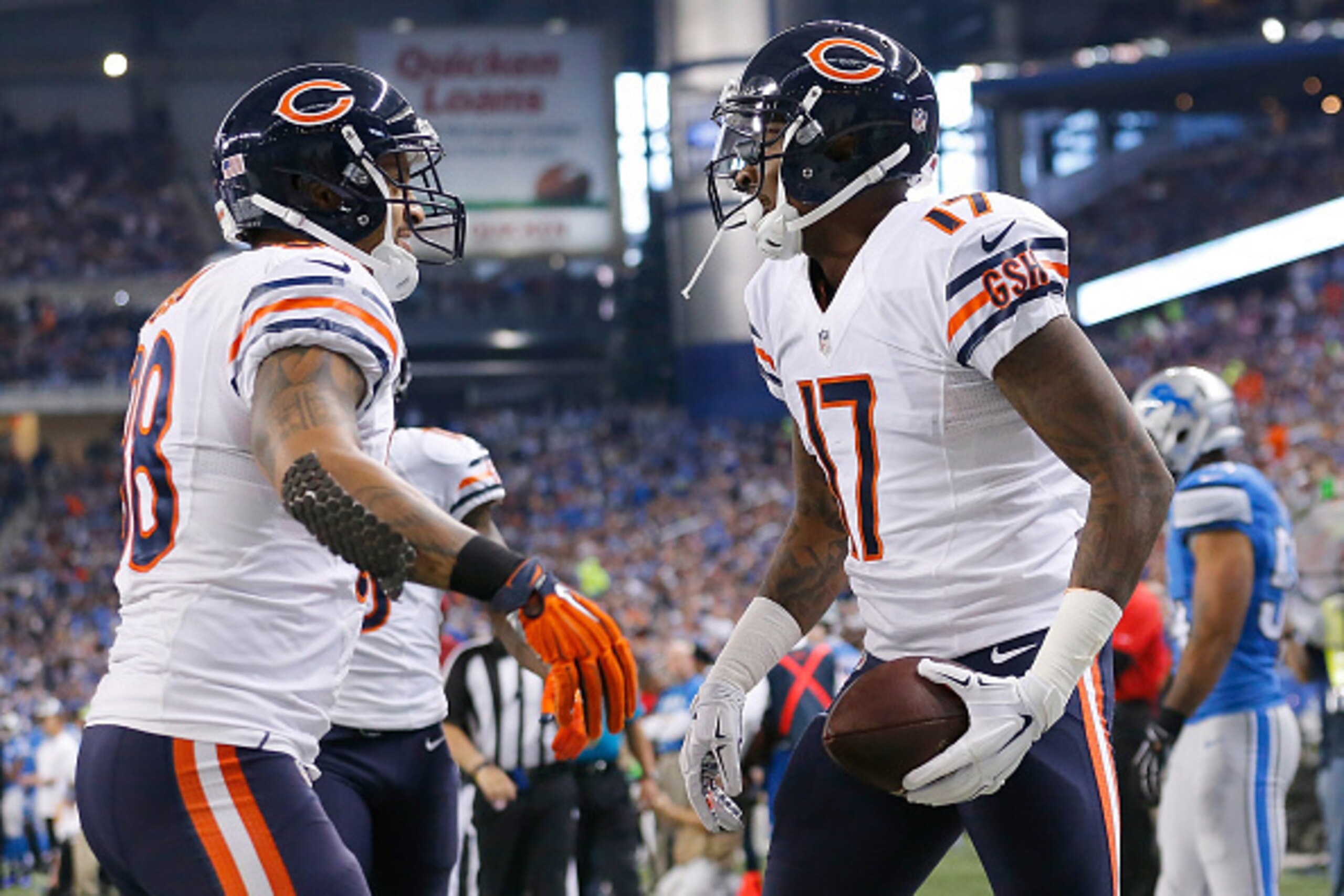 DETROIT, MI - NOVEMBER 27: Alshon Jeffery #17 celebrates a first quarter touchdown with Dante Rosario #88 of the Chicago Bears while playing the Detroit Lions at Ford Field on November 27 , 2014 in Detroit, Michigan. (Photo by Leon Halip/Getty Images)
