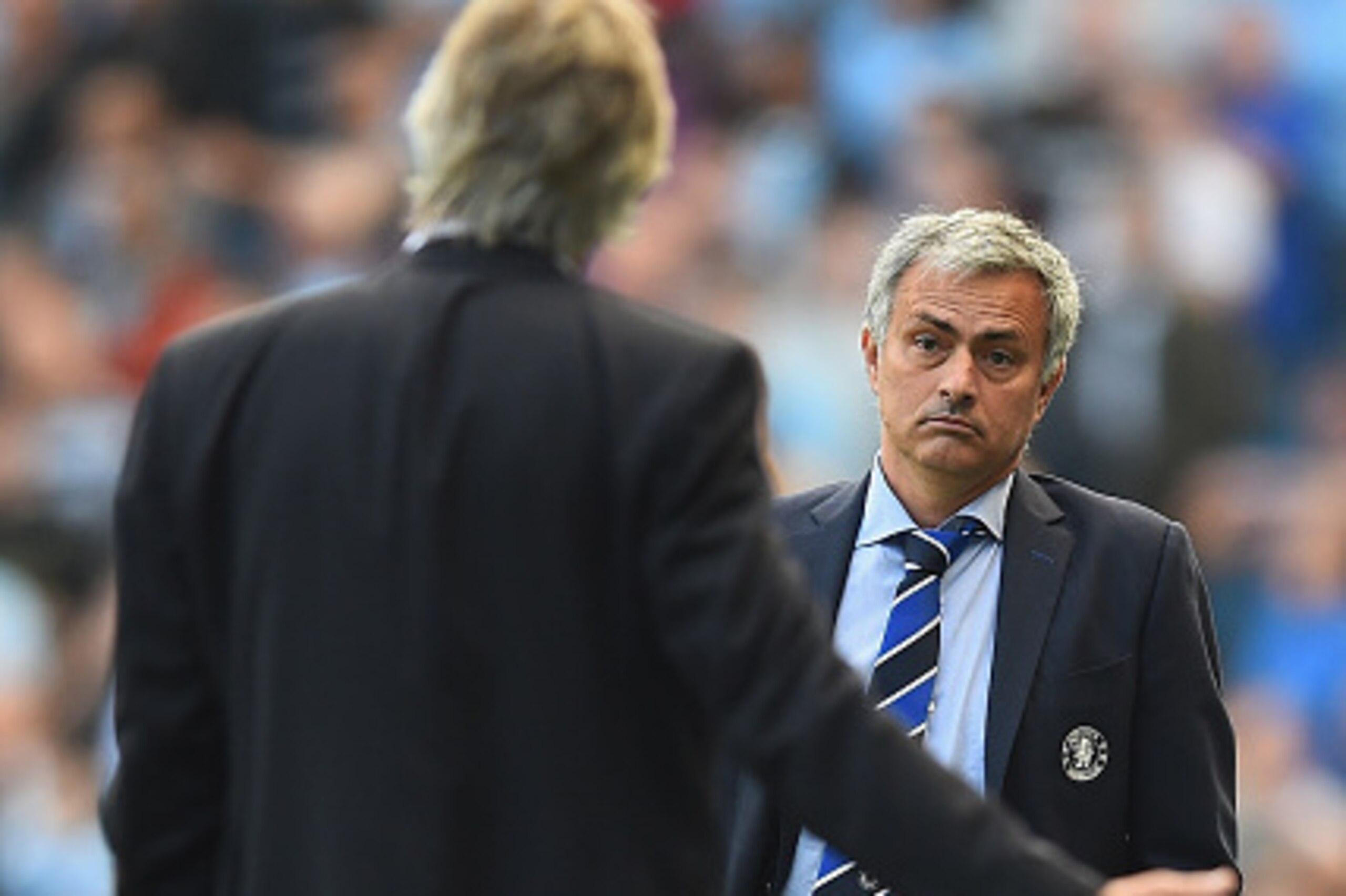 MANCHESTER, ENGLAND - SEPTEMBER 21: Jose Mourinho of Chelsea speaks with Manuel Pellegrini of Manchester City during the Barclays Premier League match between Manchester City and Chelsea at Etihad Stadium on September 21, 2014 in Manchester, England.  (Ph