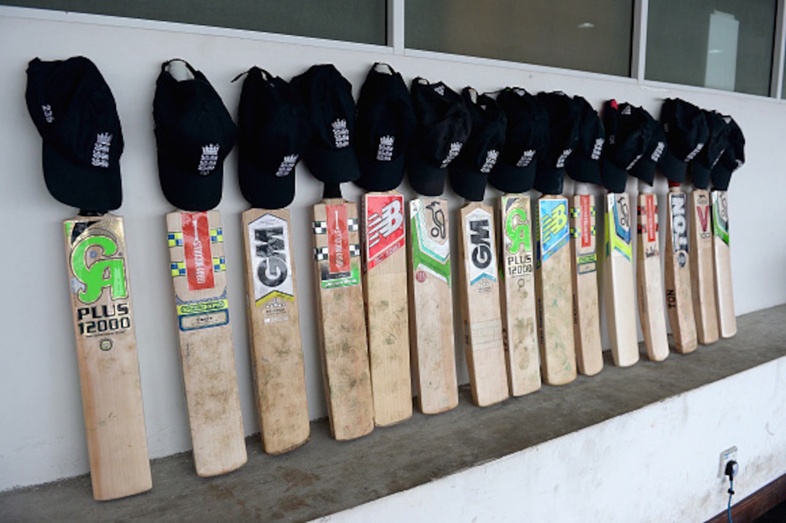 COLOMBO, SRI LANKA - NOVEMBER 28:  England cricketers put their bats out in their dressing room in memory of Australian cricketer Phil Hughes at R. Premadasa Stadium on November 28, 2014 in Colombo, Sri Lanka.  (Photo by Gareth Copley/Getty Images)