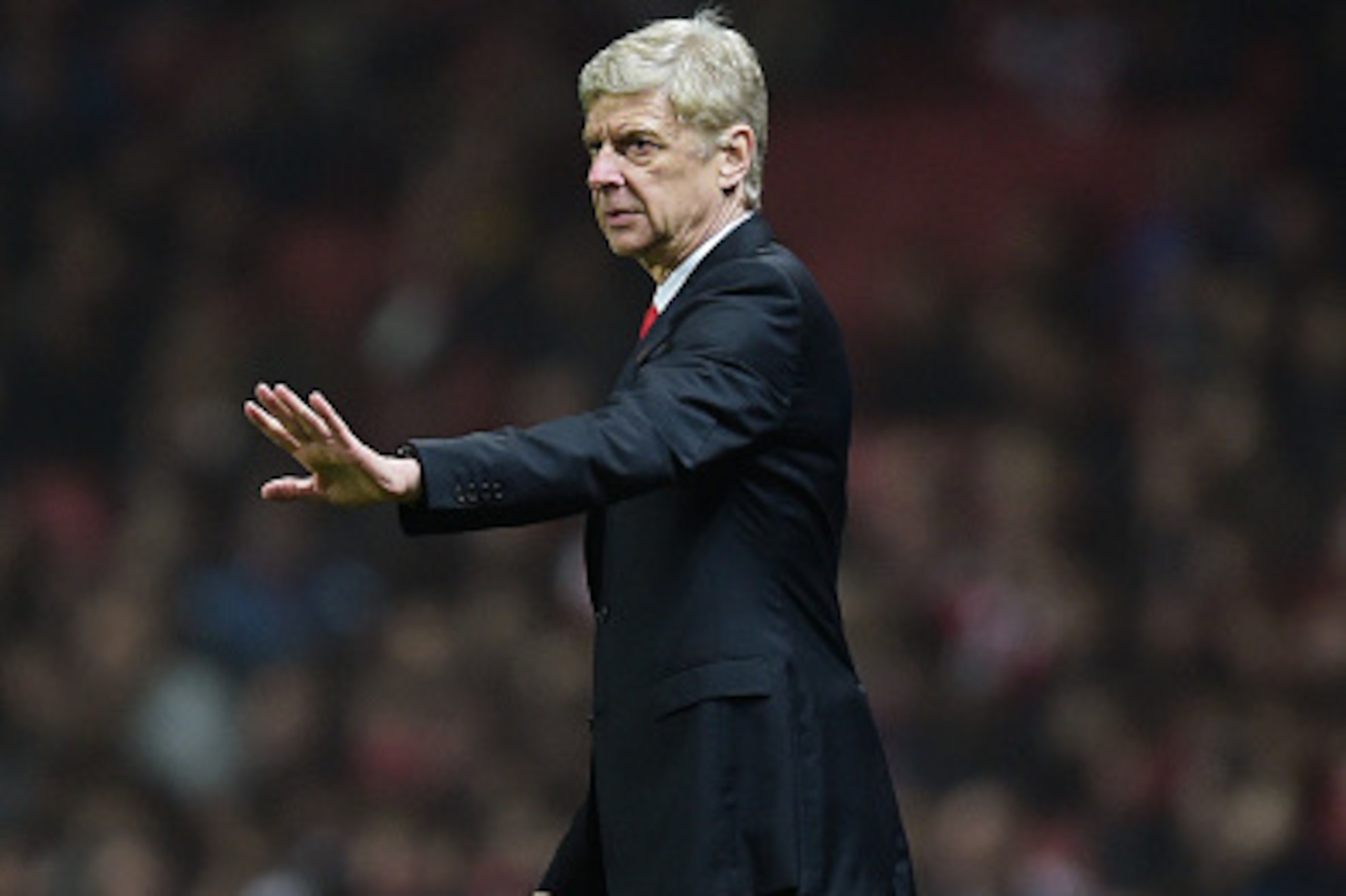 LONDON, ENGLAND - NOVEMBER 26: Arsene Wenger the Arsenal manager gestures during the UEFA Champions League Group D match between Arsenal and Borussia Dortmund at the Emirates Stadium on November 26, 2014 in London, United Kingdom. (Photo by Jamie McDona LONDON, ENGLAND - NOVEMBER 26: Arsene Wenger the Arsenal manager gestures during the UEFA Champions League Group D match between Arsenal and Borussia Dortmund at the Emirates Stadium on November 26, 2014 in London, United Kingdom. (Photo by Jamie McDona