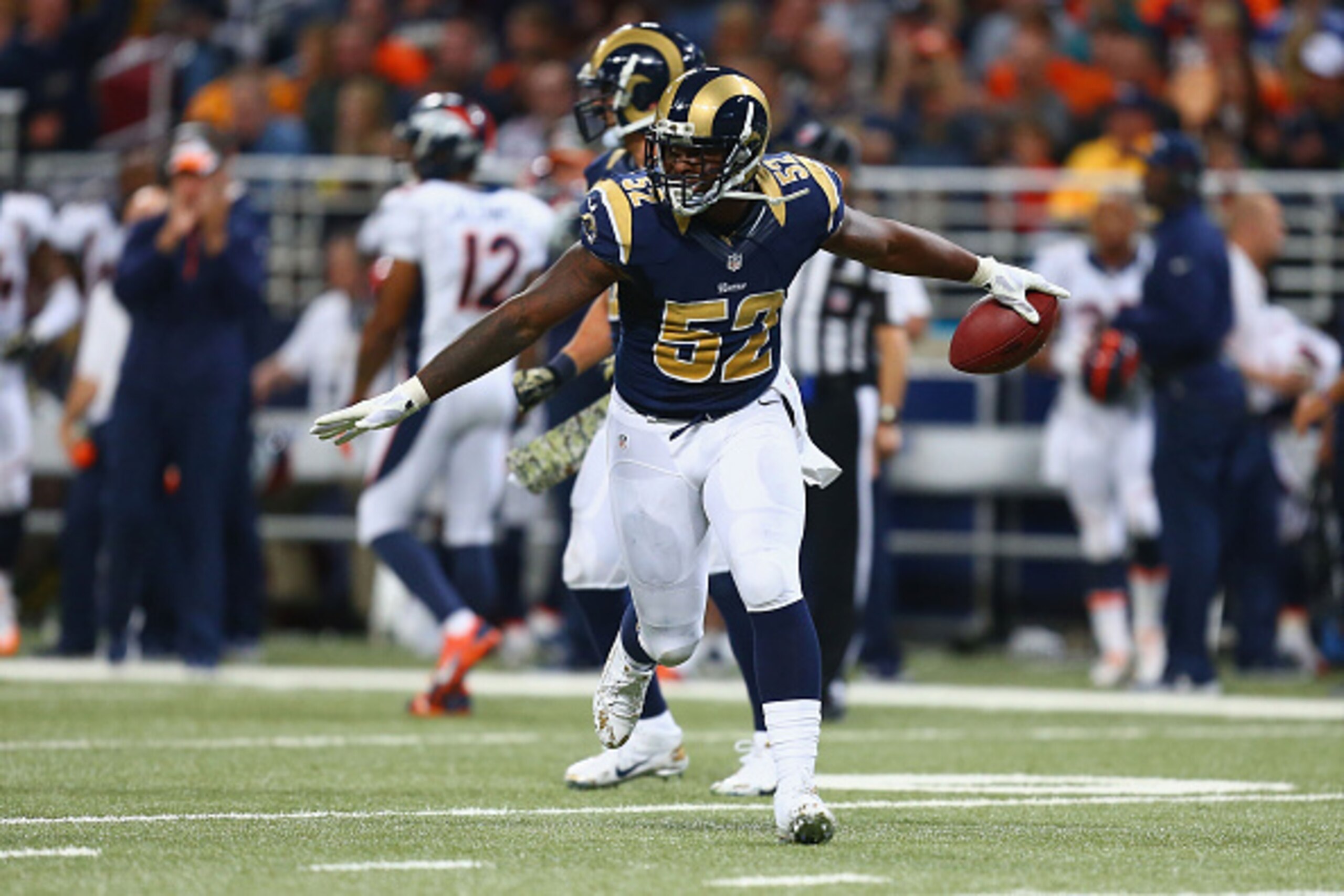 ST. LOUIS, MO - NOVEMBER 16: Alec Ogletree #52 of the St. Louis Rams celebrates after making an interception against the Denver Broncos in the fourth quarter at the Edward Jones Dome on November 16, 2014 in St. Louis, Missouri.  The Rams beat the Broncos 