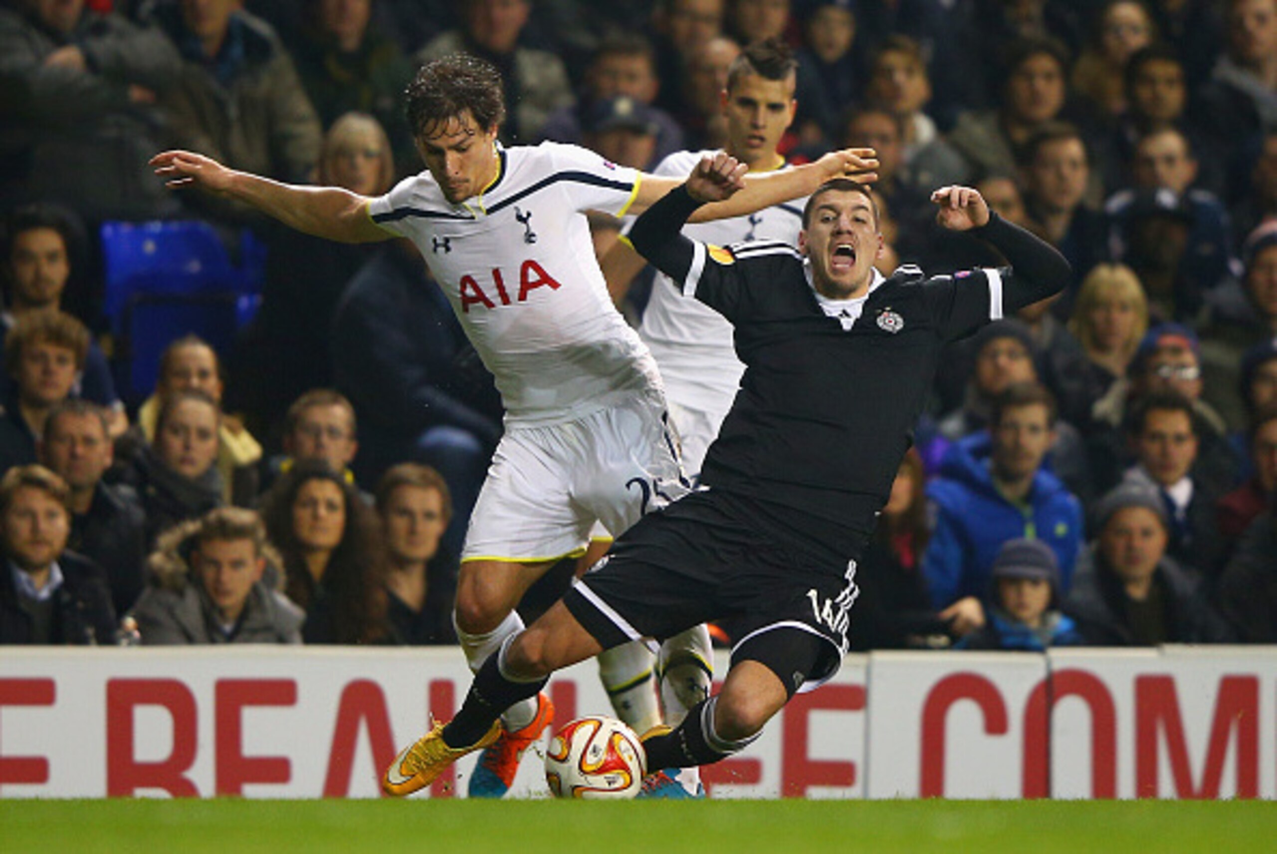LONDON, ENGLAND - NOVEMBER 27:  Benjamin Stambouli of Spurs tackles Petar Grbic of Partizan Belgrade during the UEFA Europa League group C match between Tottenham Hotspur FC and FK Partizan at White Hart Lane on November 27, 2014 in London, United Kingdom