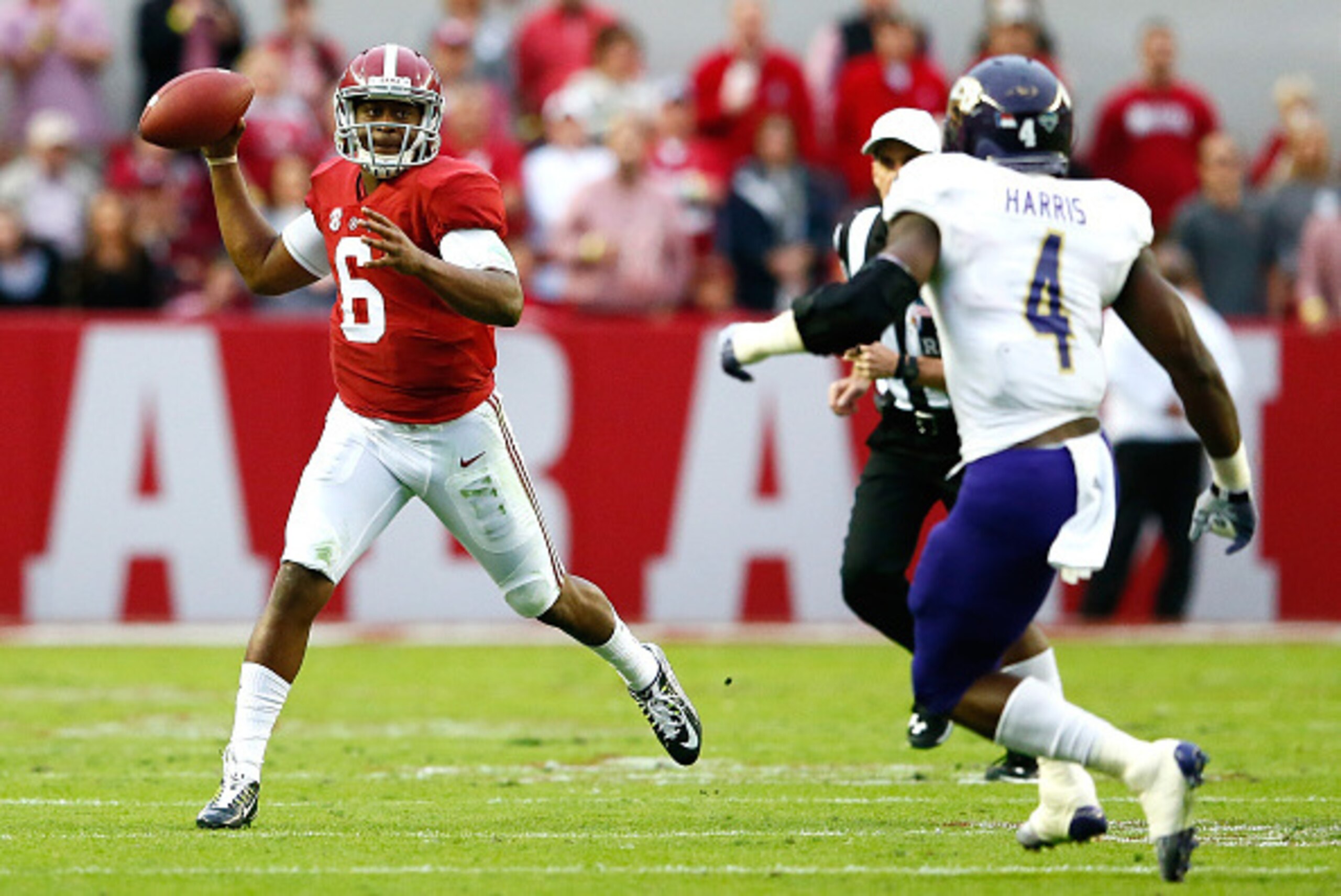 TUSCALOOSA, AL - NOVEMBER 22:  Blake Sims #6 of the Alabama Crimson Tide rolls out of the pocket against Sertonuse Harris #4 of the Western Carolina Catamounts at Bryant-Denny Stadium on November 22, 2014 in Tuscaloosa, Alabama.  (Photo by Kevin C. Cox/Ge
