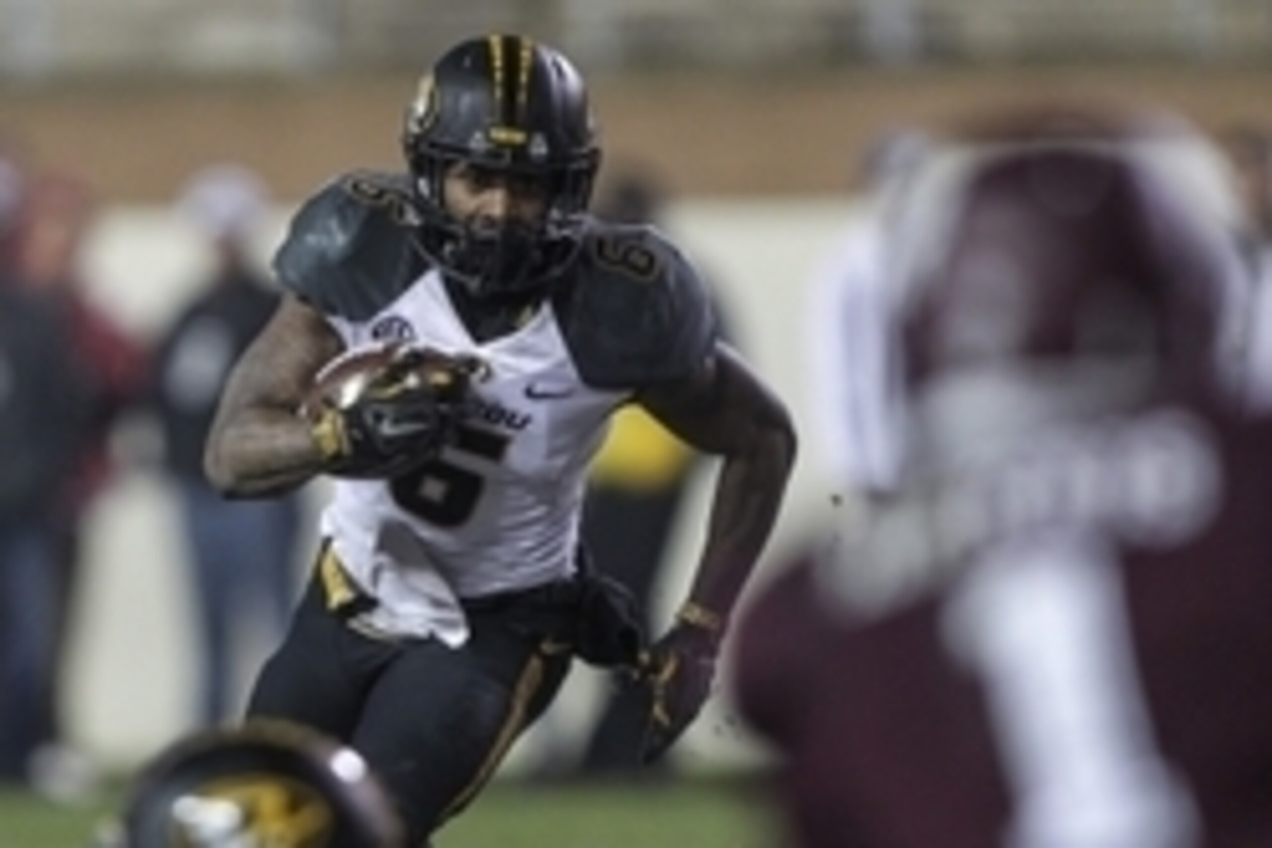 Nov 15, 2014; College Station, TX, USA; Missouri Tigers running back Marcus Murphy (6) rushes during the second quarter against the Texas A&M Aggies at Kyle Field. Mandatory Credit: Troy Taormina-USA TODAY Sports