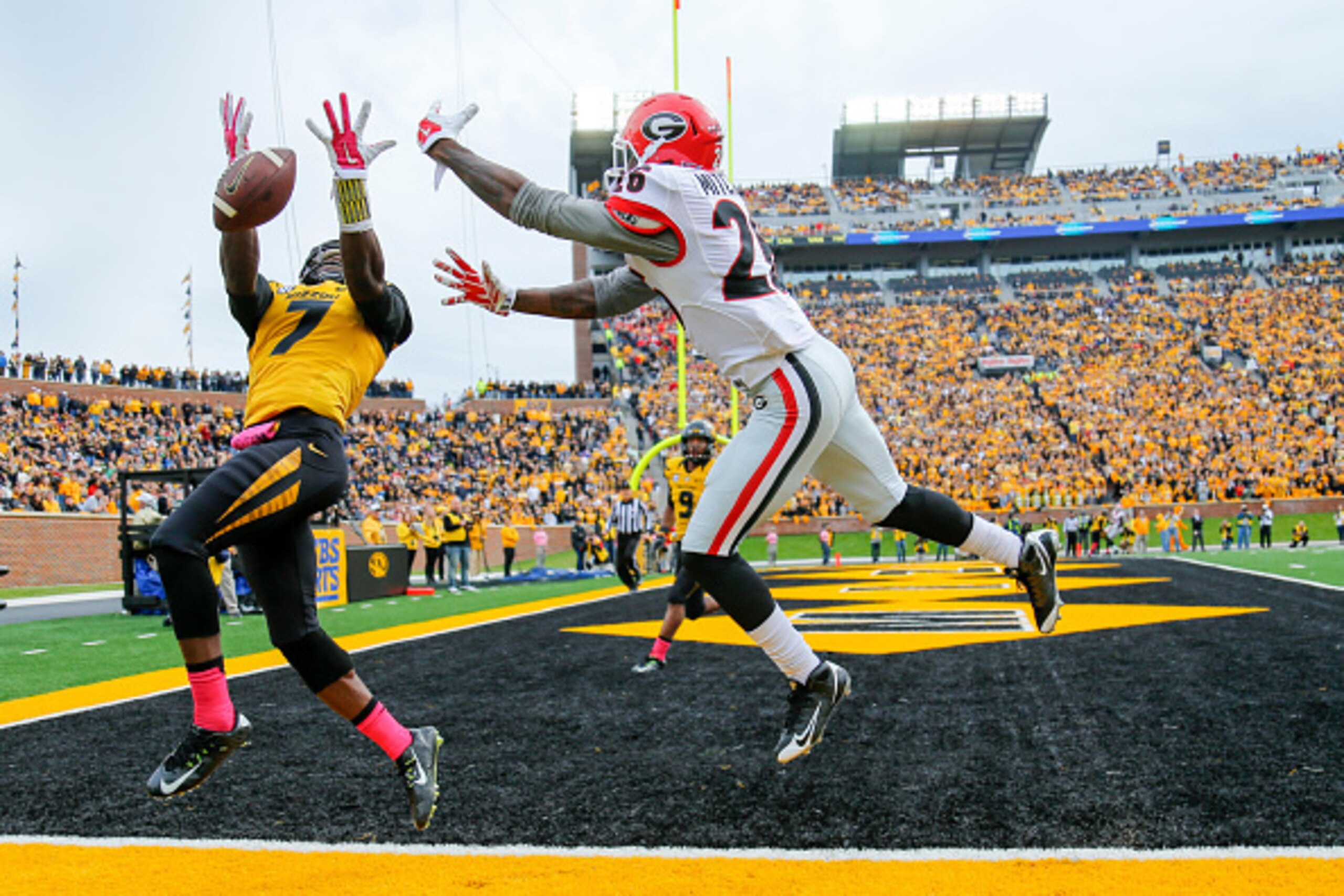 COLUMBIA, MO - OCTOBER 11:  Kenya Dennis #7 of the Missouri Tigers just misses an interception on the over thrown pass to Malcolm Mitchell #26 of the Georgia Bulldogs on October 11, 2014 at Faurot Field/Memorial Stadium in Columbia, Missouri. (Photo by Ky
