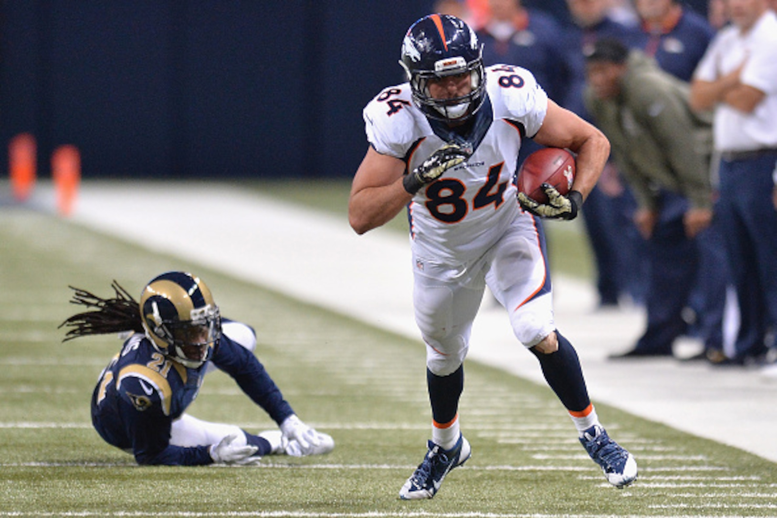 ST. LOUIS, MO - NOVEMBER 16: Jacob Tamme #84 of the Denver Broncos rushes after a catch against the St. Louis Rams at the Edward Jones Dome on November 16, 2014 in St. Louis, Missouri. The Rams defeated the Broncos 22-7. (Photo by Michael B. Thomas/Getty 