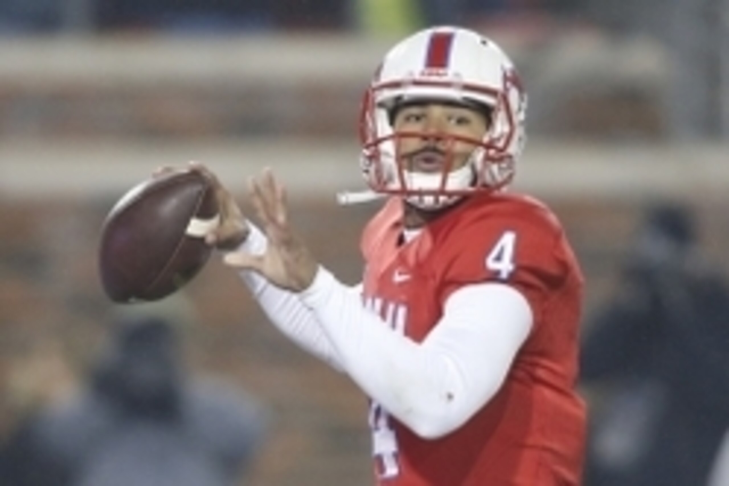 Nov 15, 2014; Dallas, TX, USA; Southern Methodist Mustangs quarterback Matt Davis (4) throws a pass in the first quarter against the South Florida Bulls  at Gerald J. Ford Stadium. Mandatory Credit: Tim Heitman-USA TODAY Sports