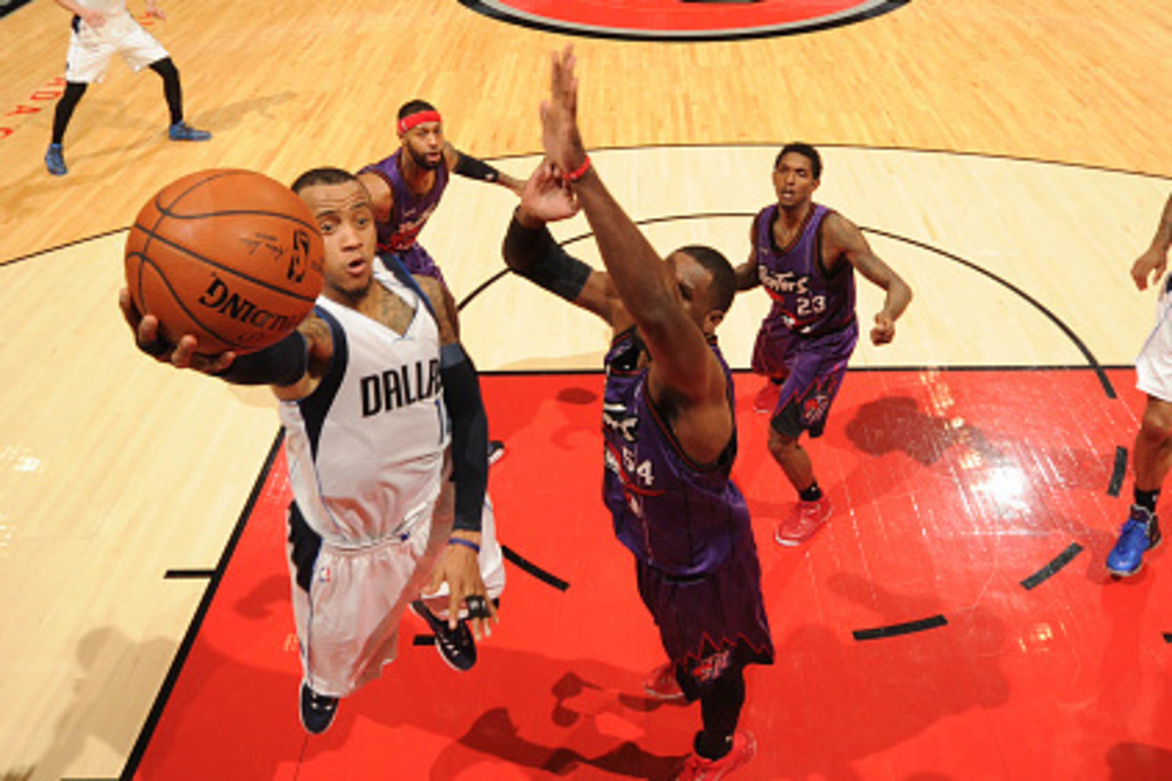 TORONTO, CANADA - NOVEMBER 28: Monta Ellis #11 of the Dallas Mavericks shoots the ball against the Toronto Raptors during the game on November 28, 2014 at the Air Canada Centre in Toronto, Ontario, Canada. NOTE TO USER: User expressly acknowledges and a TORONTO, CANADA - NOVEMBER 28: Monta Ellis #11 of the Dallas Mavericks shoots the ball against the Toronto Raptors during the game on November 28, 2014 at the Air Canada Centre in Toronto, Ontario, Canada. NOTE TO USER: User expressly acknowledges and a