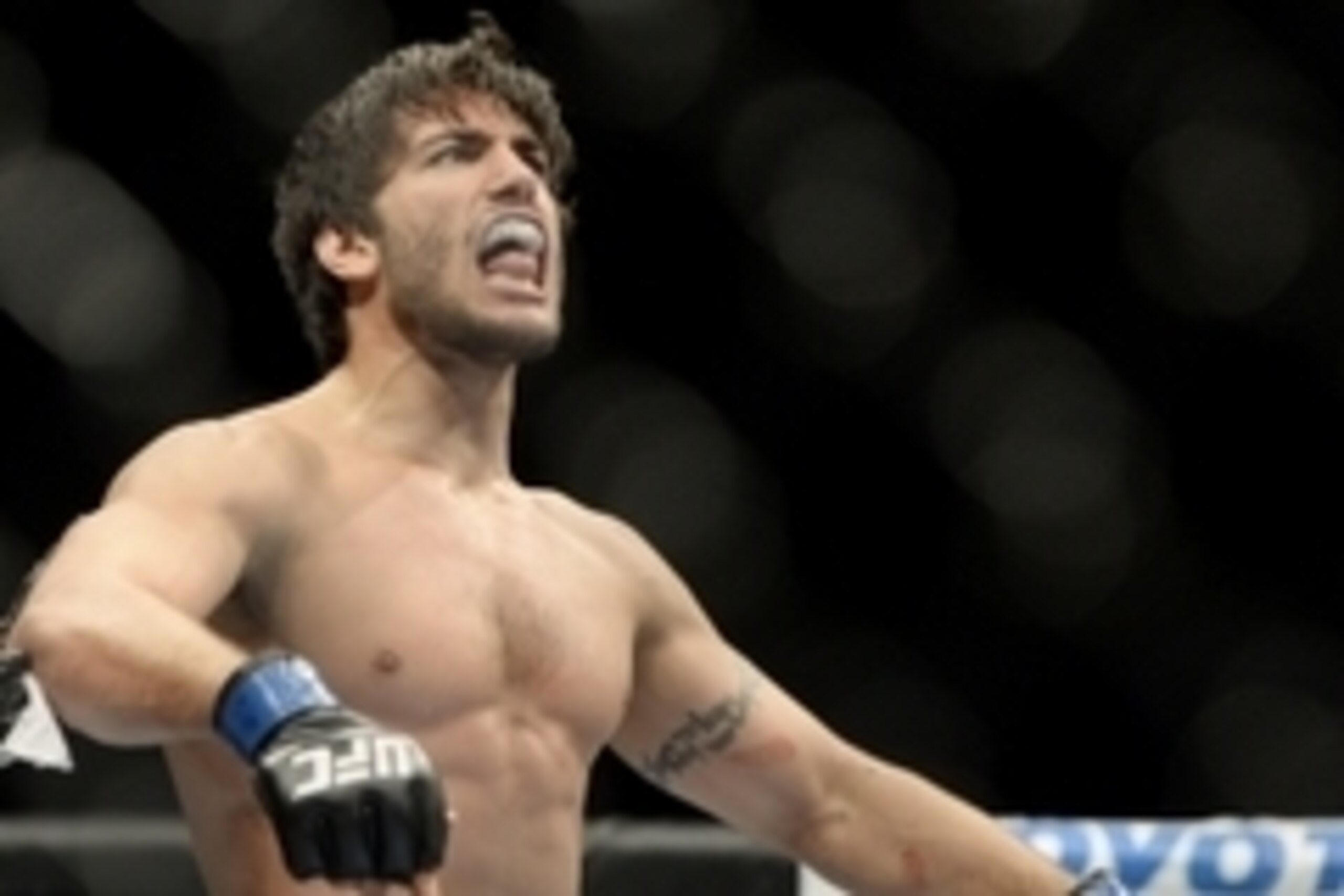 Apr 16, 2014; Quebec City, Quebec, Canada; Elias Theodorou (blue gloves) reacts after his fight against Sheldon Westcott (not pictured) during their middleweight bout at Colisee Pepsi. Mandatory Credit: Eric Bolte-USA TODAY Sports