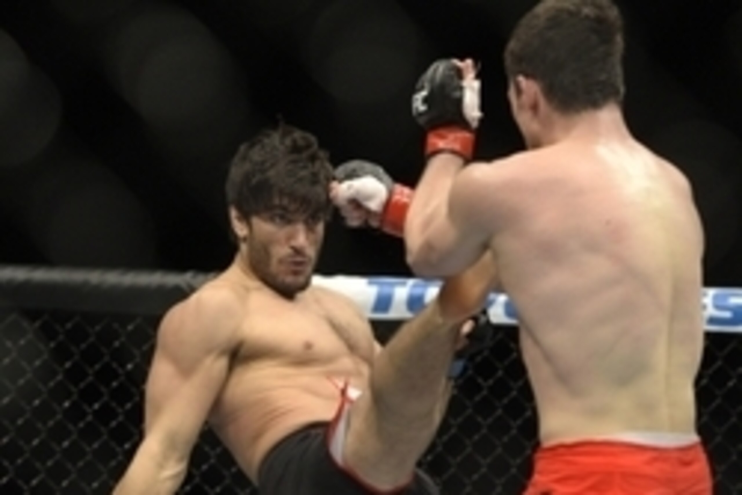 Apr 16, 2014; Quebec City, Quebec, Canada; Sheldon Westcott (red gloves) fights against Elias Theodorou (blue gloves) during their middleweight bout at Colisee Pepsi. Mandatory Credit: Eric Bolte-USA TODAY Sports