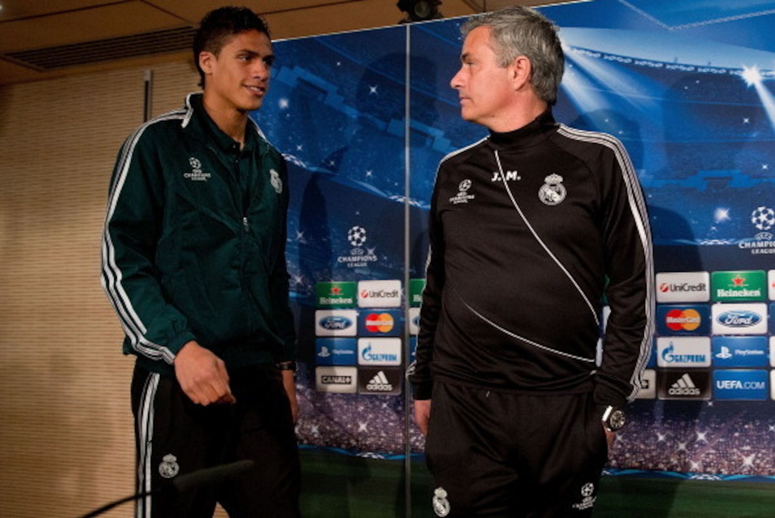 MADRID, SPAIN - APRIL 02:  Head coach Jose Mourinho (R) and Real madrid player Raphael varane prior to start a press conference ahead of the UEFA Champions League Quarterfinal match between Real Madrid and Galatasaray AS at Santiago Bernabeu Stadium on Ap