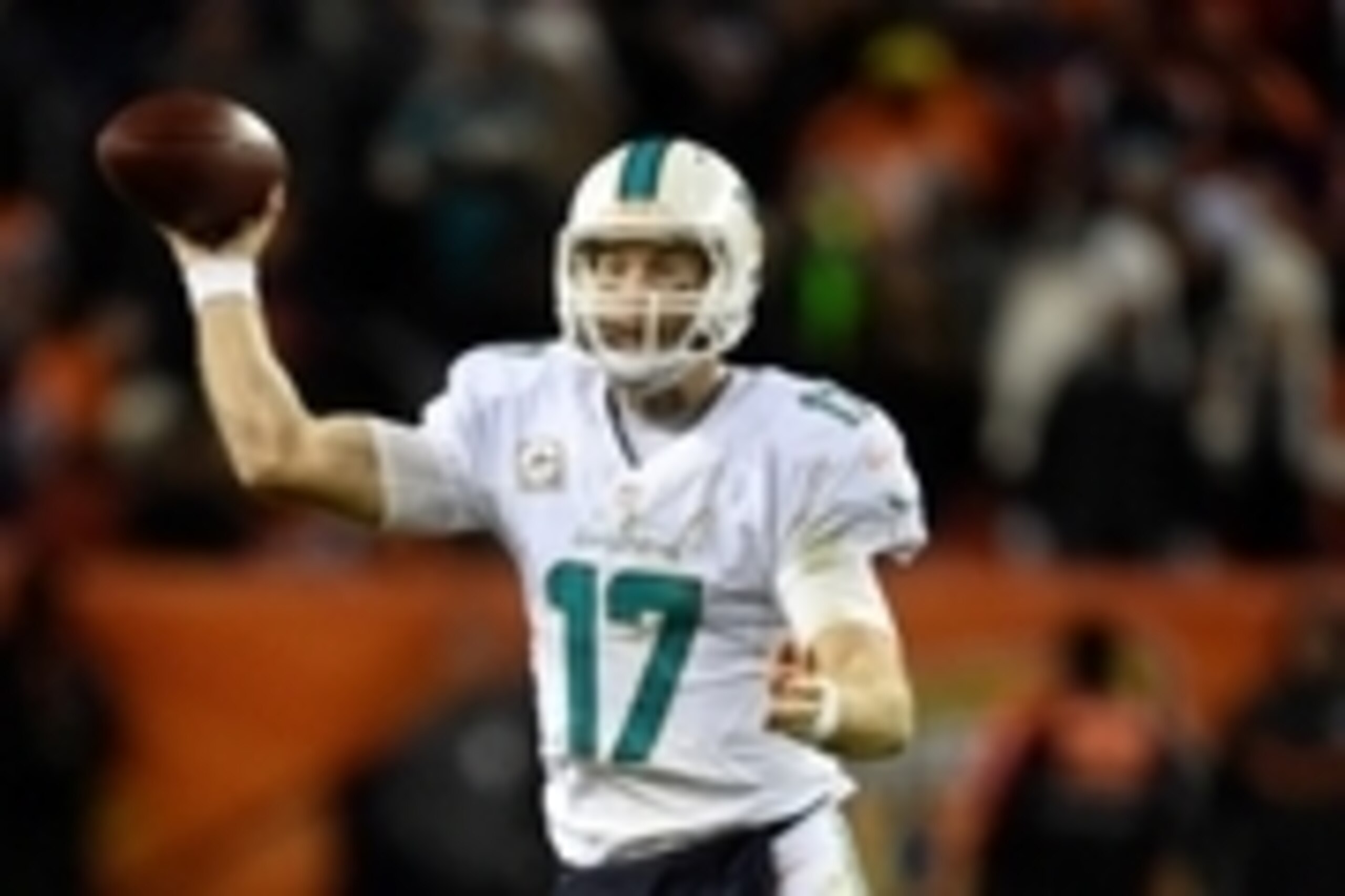 Nov 23, 2014; Denver, CO, USA; Miami Dolphins quarterback Ryan Tannehill (17) passes in the fourth quarter against the Denver Broncos at Sports Authority Field at Mile High. The Denver Broncos defeated the Miami Dolphins 39-36. Mandatory Credit: Ron Cheno