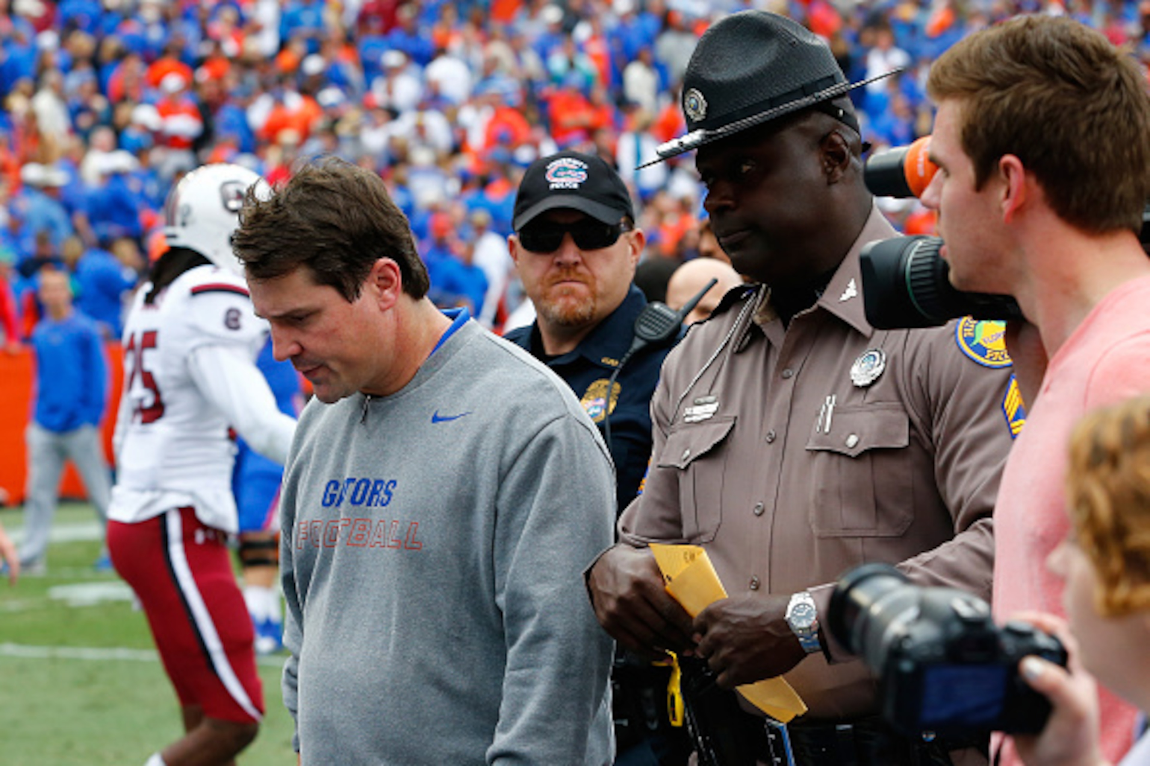 GAINESVILLE, FL - NOVEMBER 15: Head coach Will Muschamp of the Florida Gators walks off the field after an overtime loss to the South Carolina Gamecocks at Ben Hill Griffin Stadium on November 15, 2014 in Gainesville, Florida. The Gamecocks won 23-20. (P GAINESVILLE, FL - NOVEMBER 15: Head coach Will Muschamp of the Florida Gators walks off the field after an overtime loss to the South Carolina Gamecocks at Ben Hill Griffin Stadium on November 15, 2014 in Gainesville, Florida. The Gamecocks won 23-20. (P