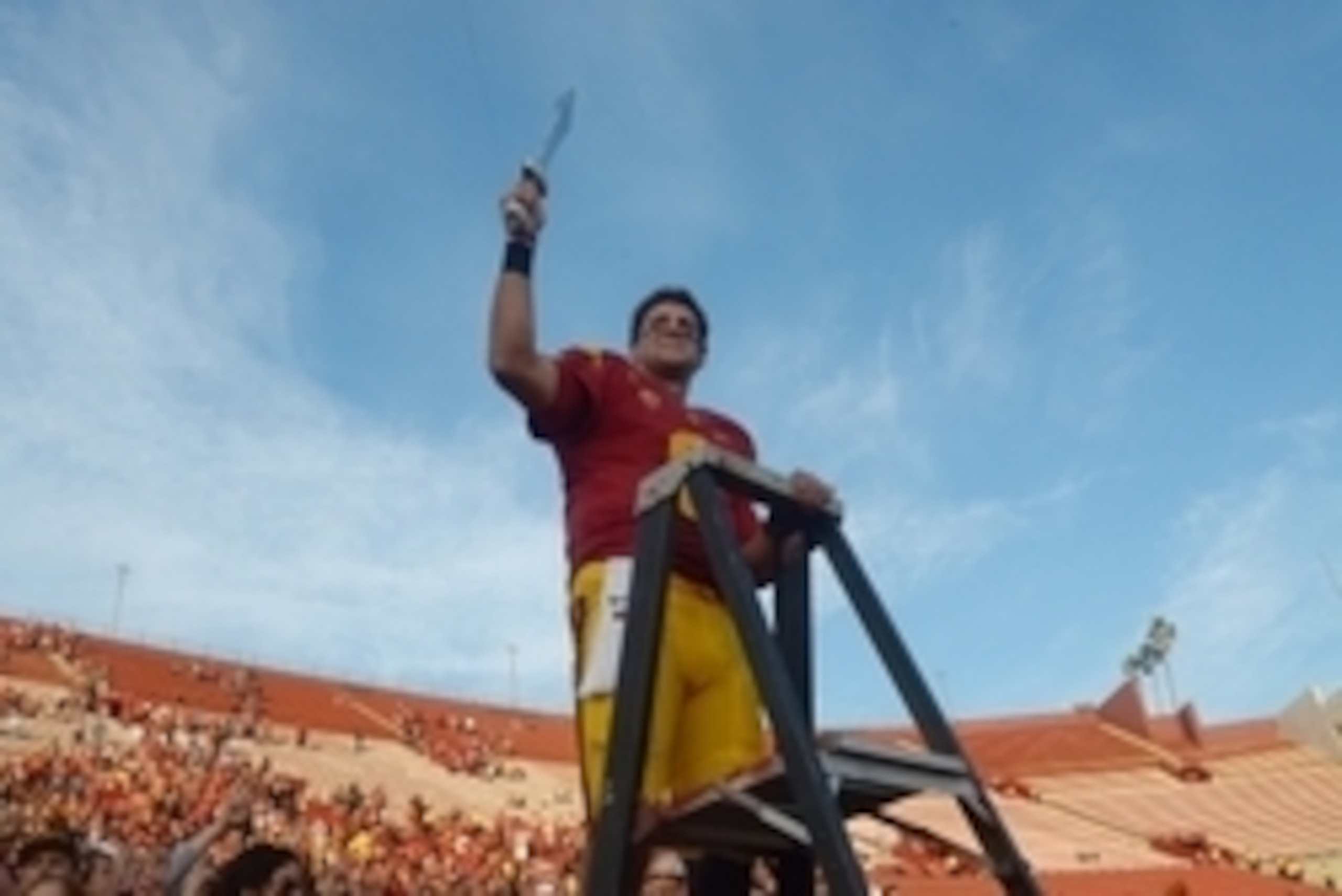 Nov 29, 2014; Los Angeles, CA, USA; Southern California Trojans quarterback Cody Kessler (6) conducts the Spirit of Troy marching band after the game against the Notre Dame Fighting Irish at Los Angeles Memorial Coliseum. USC defeated Notre Dame 49-14.  M