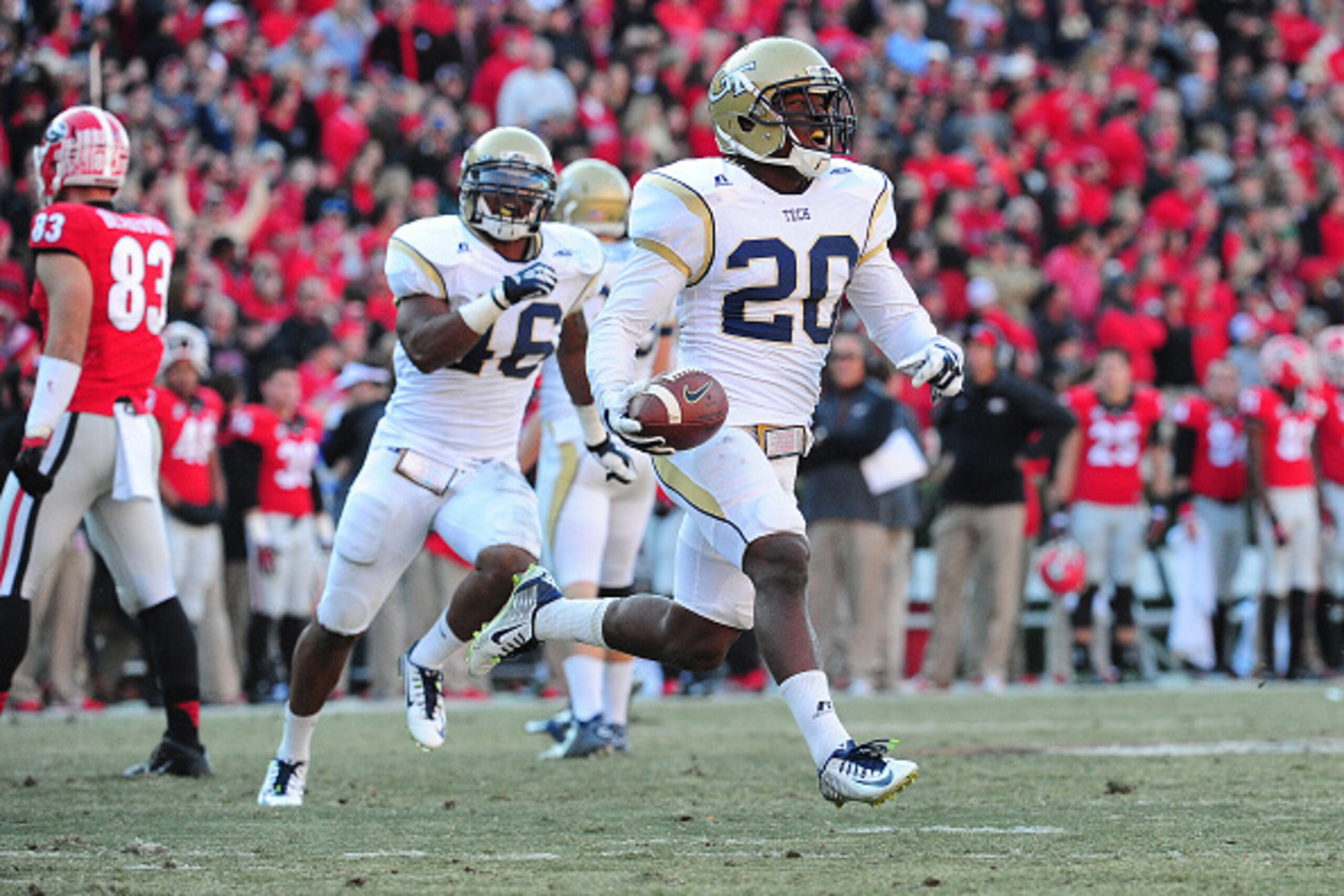 ATHENS, GA - NOVEMBER 29: Lawrence Austin #20 of the Georgia Tech Yellow Jackets celebrates after recovering an onsides kick against the Georgia Bulldogs at Sanford Stadium on November 29, 2014 in Athens, Georgia. (Photo by Scott Cunningham/Getty Images)