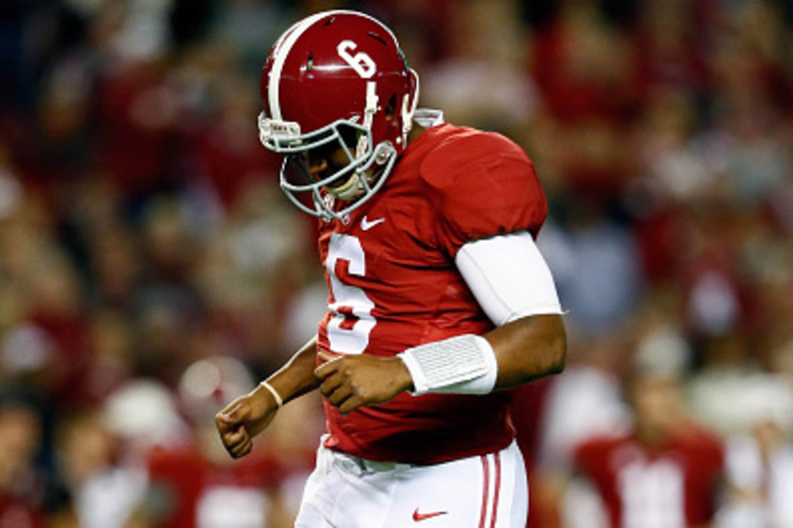 TUSCALOOSA, AL - NOVEMBER 29:  Blake Sims #6 of the Alabama Crimson Tide reacts after hurtting his ankle during a play in the first quarter against the Auburn Tigers during the Iron Bowl at Bryant-Denny Stadium on November 29, 2014 in Tuscaloosa, Alabama.