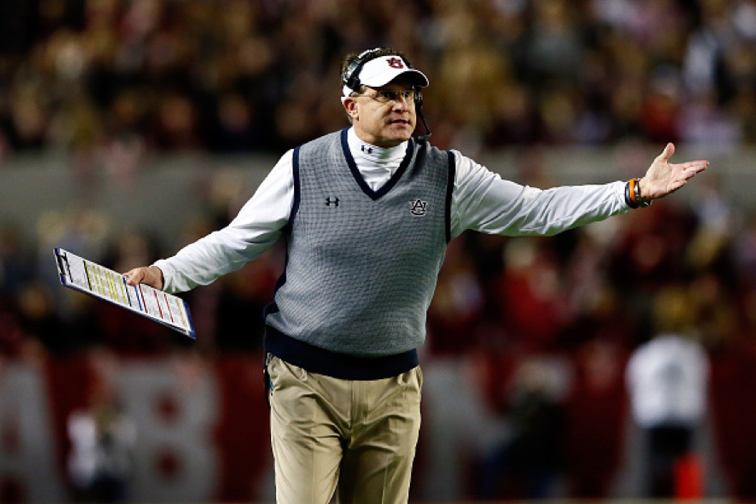 TUSCALOOSA, AL - NOVEMBER 29:  Head coach Gus Malzahn of the Auburn Tigers shouts in the first half during the Iron Bowl against the Alabama Crimson Tide at Bryant-Denny Stadium on November 29, 2014 in Tuscaloosa, Alabama.  (Photo by Kevin C. Cox/Getty Im