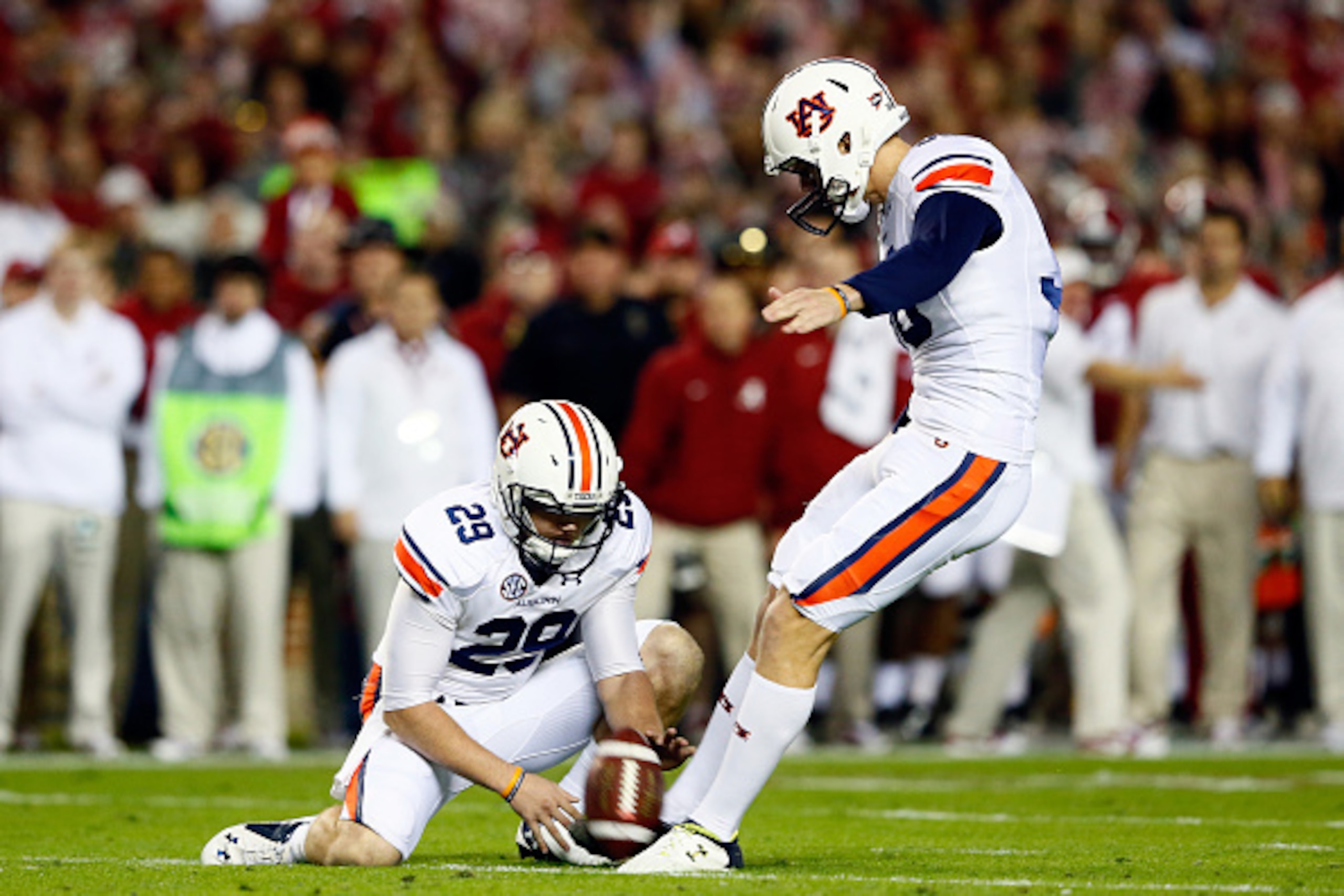 TUSCALOOSA, AL - NOVEMBER 29:  Daniel Carlson #38 of the Auburn Tigers kicks a field goal in the first quarter against the Alabama Crimson Tide during the Iron Bowl at Bryant-Denny Stadium on November 29, 2014 in Tuscaloosa, Alabama.  (Photo by Kevin C. C