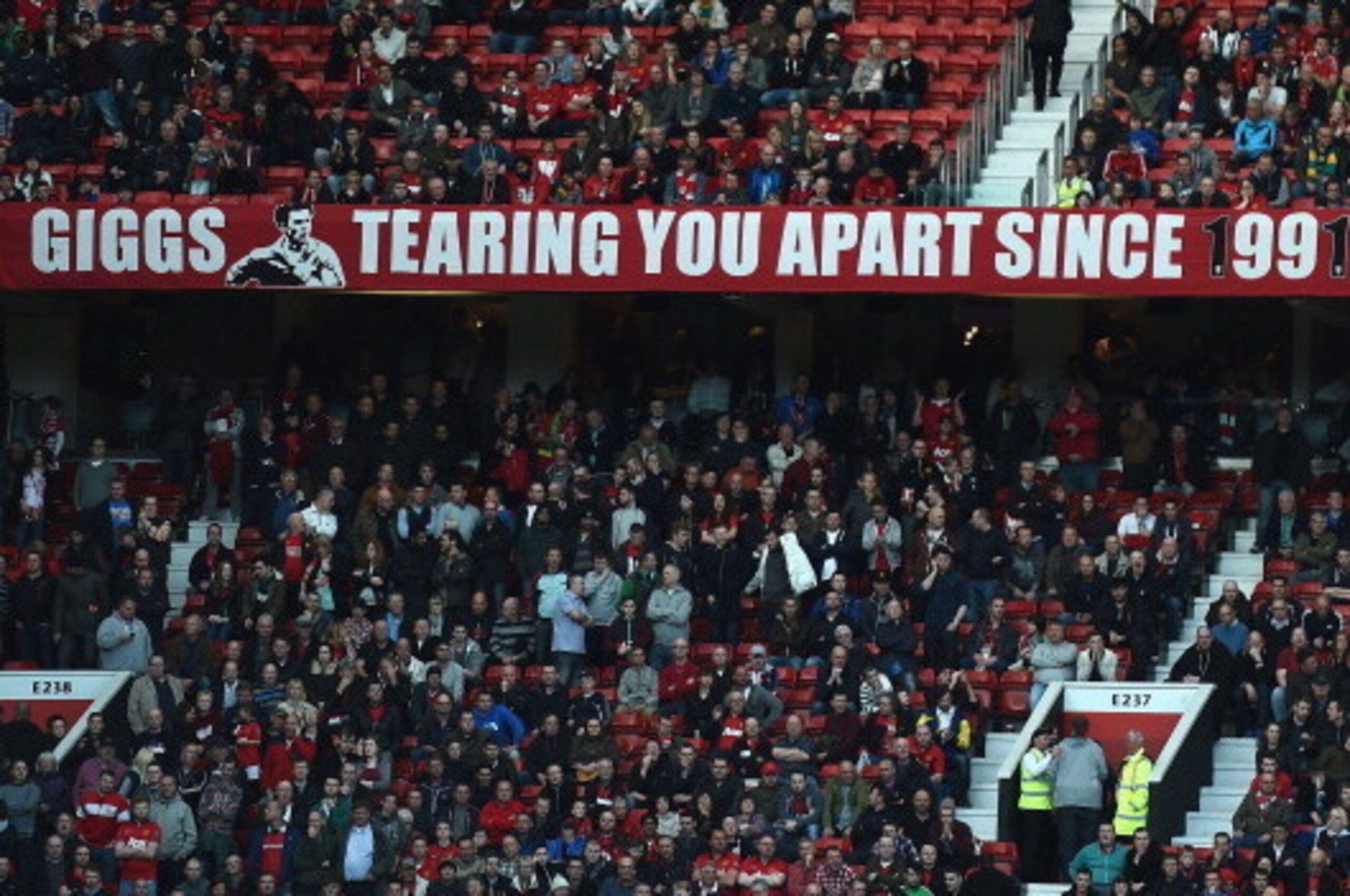 MANCHESTER, ENGLAND - APRIL 26:  A banner showing support of Ryan Giggs during the Barclays Premier League match between Manchester United and Norwich City at Old Trafford on April 26, 2014 in Manchester, England.  (Photo by Laurence Griffiths/Getty Image
