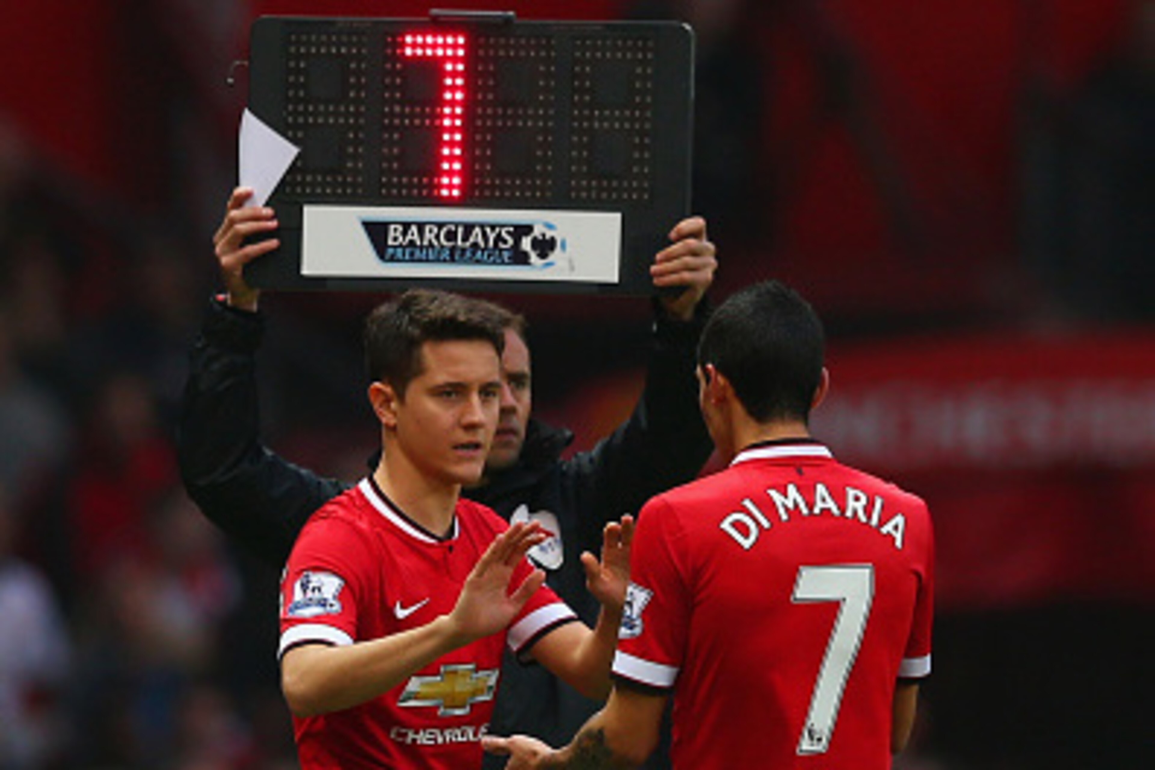 MANCHESTER, ENGLAND - NOVEMBER 29:  Ander Herrera of Manchester United replaces Angel di Maria of Manchester United during the Barclays Premier League match between Manchester United and Hull City at Old Trafford on November 29, 2014 in Manchester, Englan