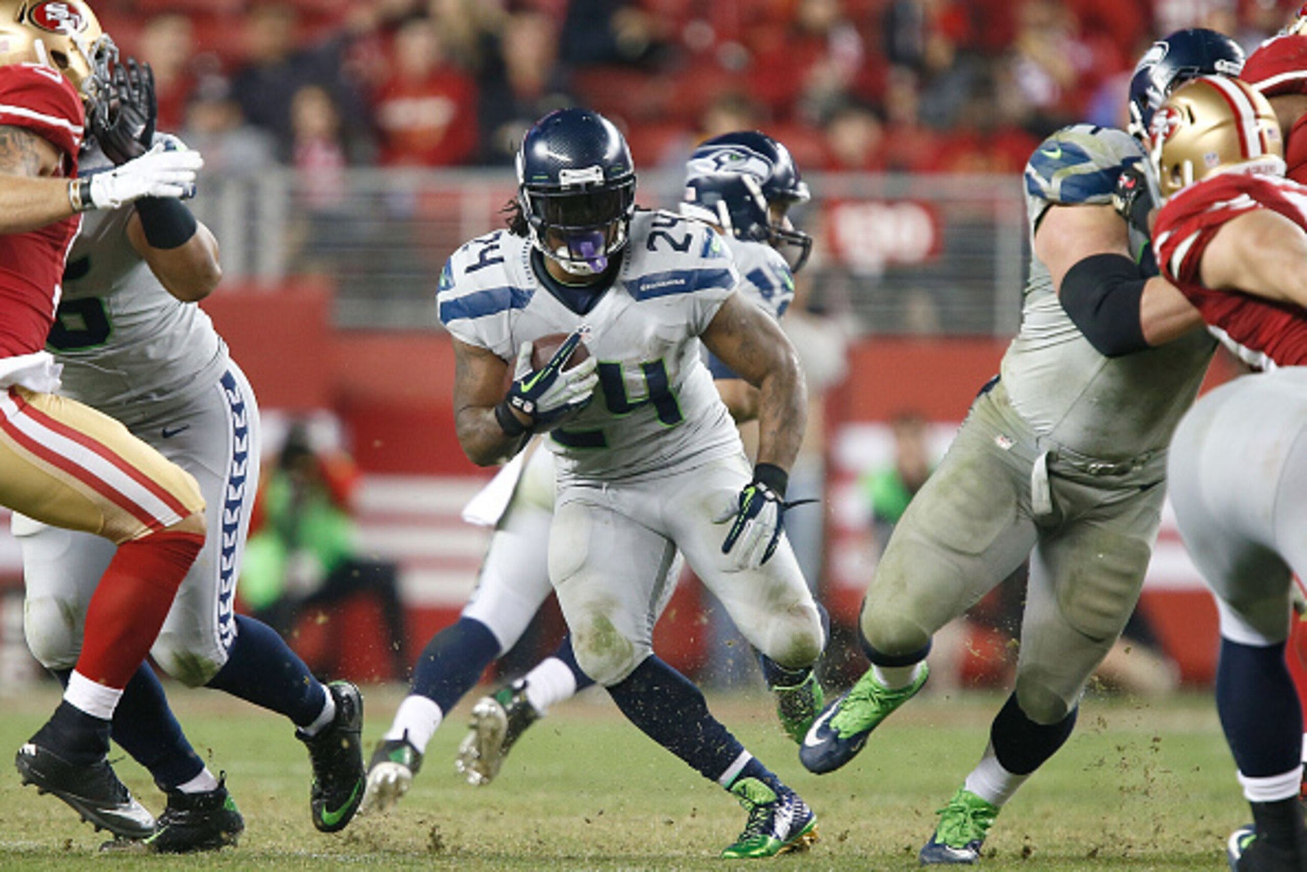 SANTA CLARA, CA - NOVEMBER 27:  Marshawn Lynch #24 of the Seattle Seahawks runs up the middle against the San Francisco 49ers in the fourth quarter at Levi's Stadium on November 27, 2014 in Santa Clara, California.  (Photo by Brian Bahr/Getty Images)