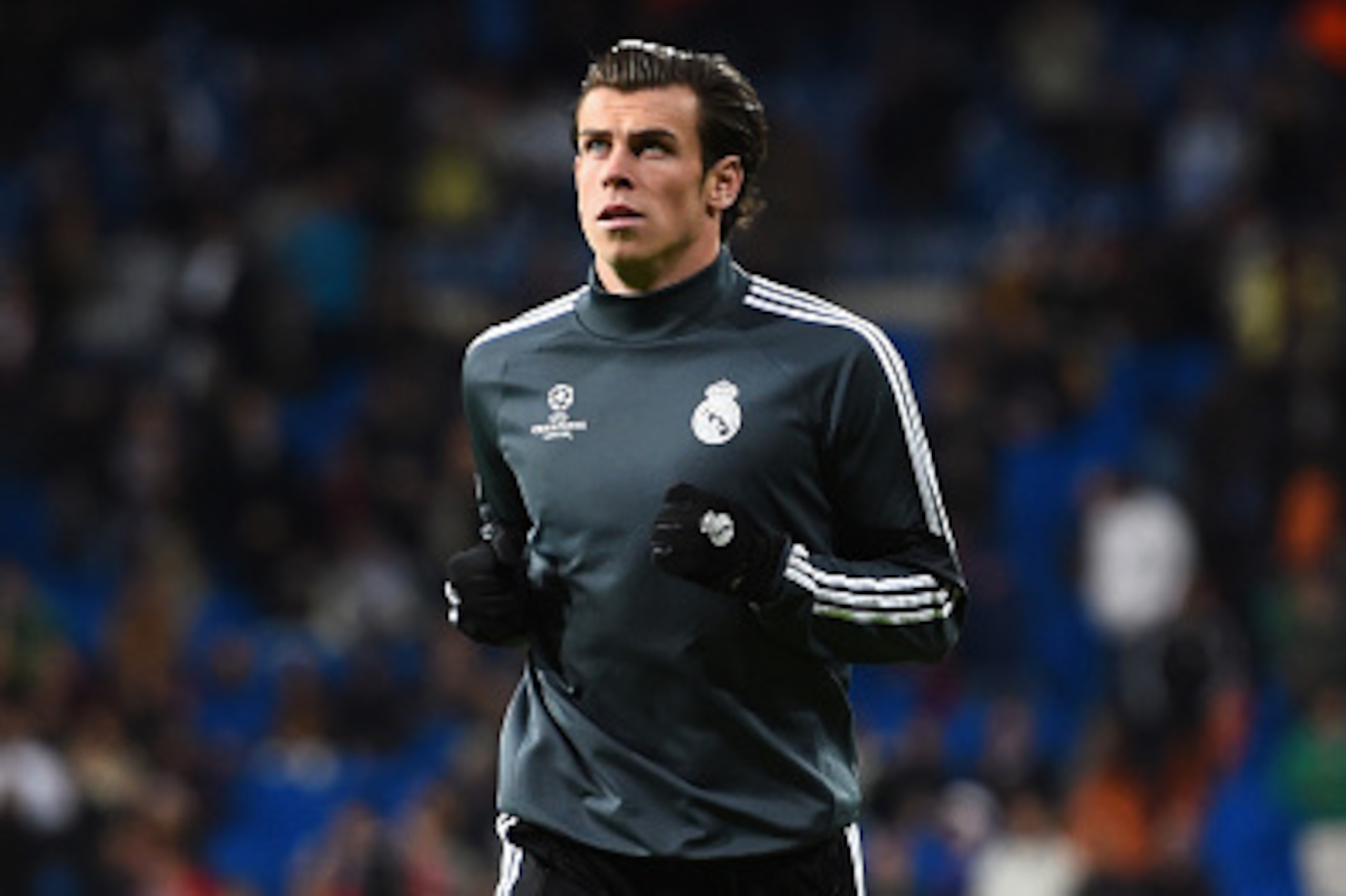 MADRID, SPAIN - NOVEMBER 04:  Gareth Bale of Real Madrid CF warms up prior to  the UEFA Champions League Group B match between Real Madrid CF and Liverpool FC at Estadio Santiago Bernabeu on November 4, 2014 in Madrid, Spain.  (Photo by Shaun Botterill/Ge