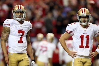 ATLANTA, GA - JANUARY 20:  Quarterbacks Colin Kaepernick #7 and quarterback Alex Smith #11 of the San Francisco 49ers warm up before taking on the Atlanta Falcons in the NFC Championship game at the Georgia Dome on January 20, 2013 in Atlanta, Georgia.  (