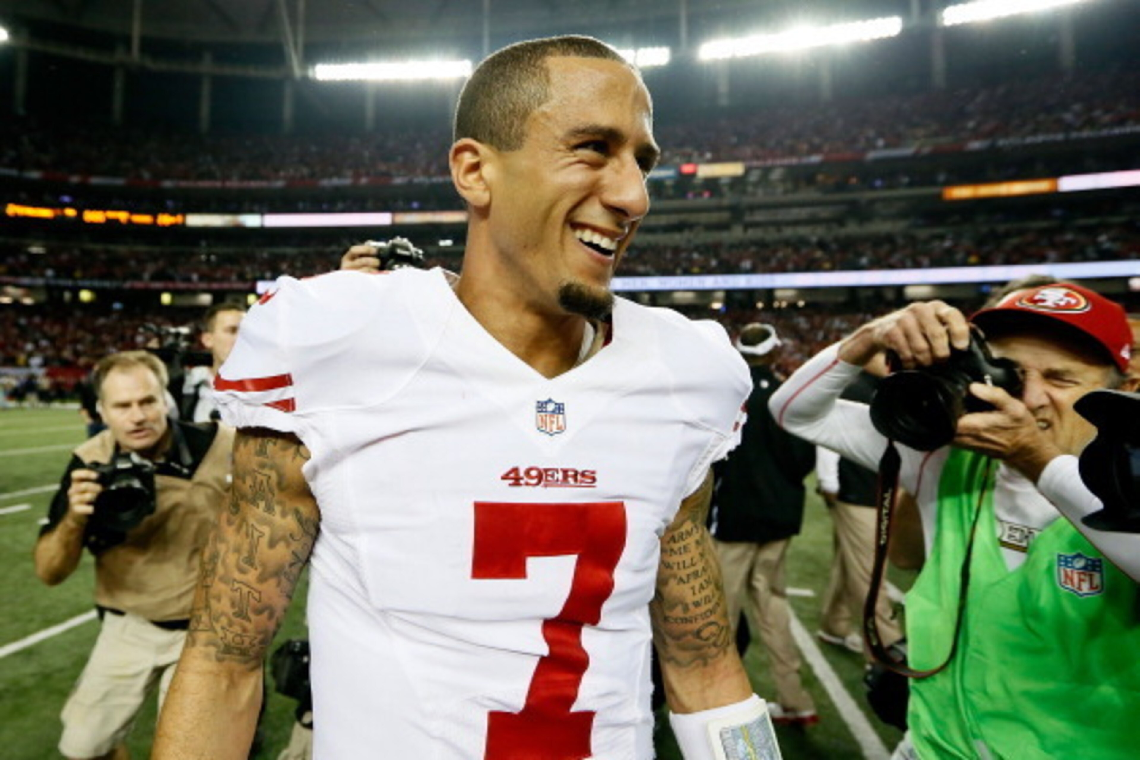 ATLANTA, GA - JANUARY 20:  Colin Kaepernick #7 of the San Francisco 49ers celebrates on the field after the 49ers won 28-24 against the Atlanta Falcons in the NFC Championship game at the Georgia Dome on January 20, 2013 in Atlanta, Georgia.  (Photo by Ke