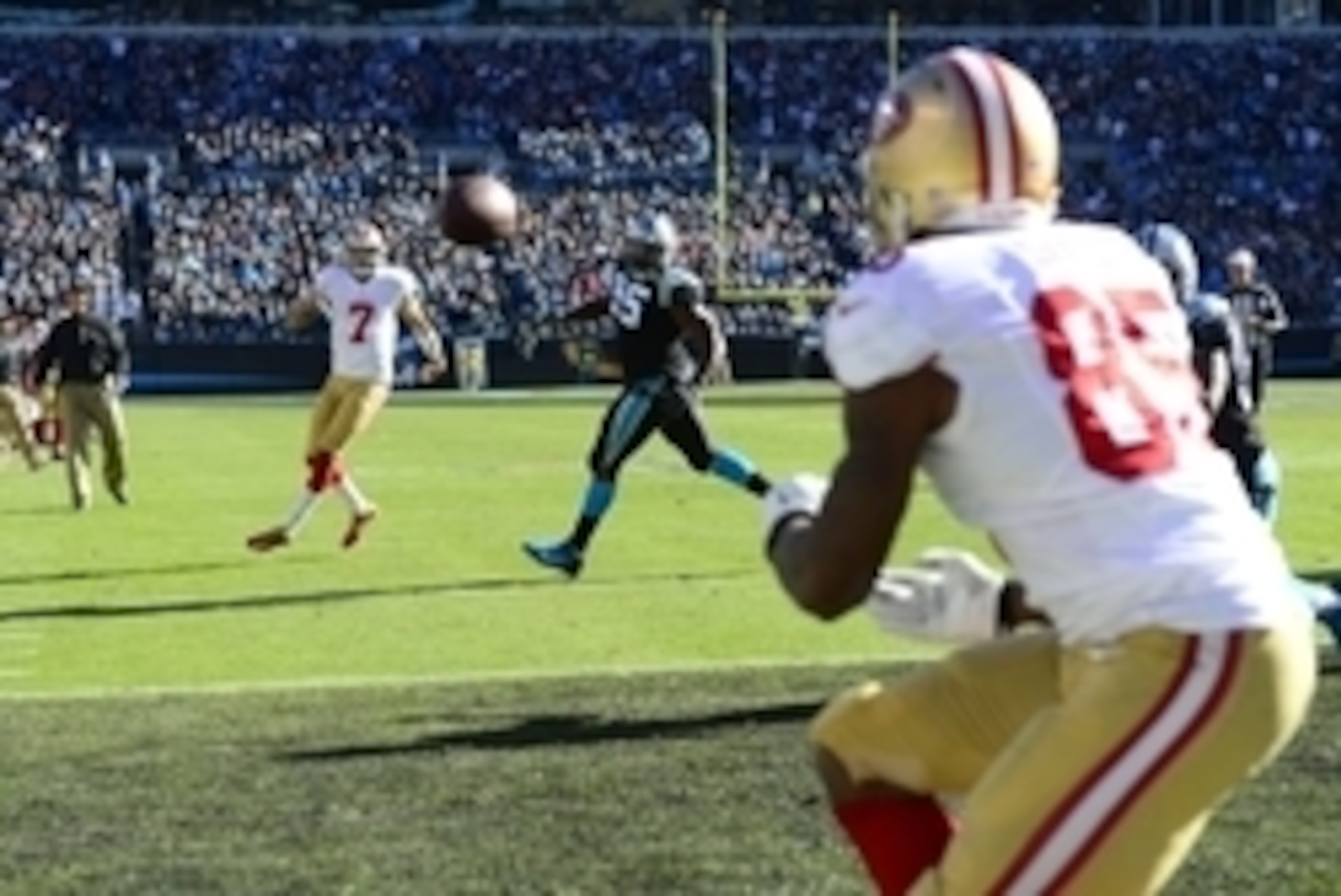 Jan 12, 2014; Charlotte, NC, USA; San Francisco 49ers quarterback Colin Kaepernick (7) throws a touchdown to tight end Vernon Davis (85) against the Carolina Panthers during the second quarter of the 2013 NFC divisional playoff football game at Bank of Am Jan 12, 2014; Charlotte, NC, USA; San Francisco 49ers quarterback Colin Kaepernick (7) throws a touchdown to tight end Vernon Davis (85) against the Carolina Panthers during the second quarter of the 2013 NFC divisional playoff football game at Bank of Am