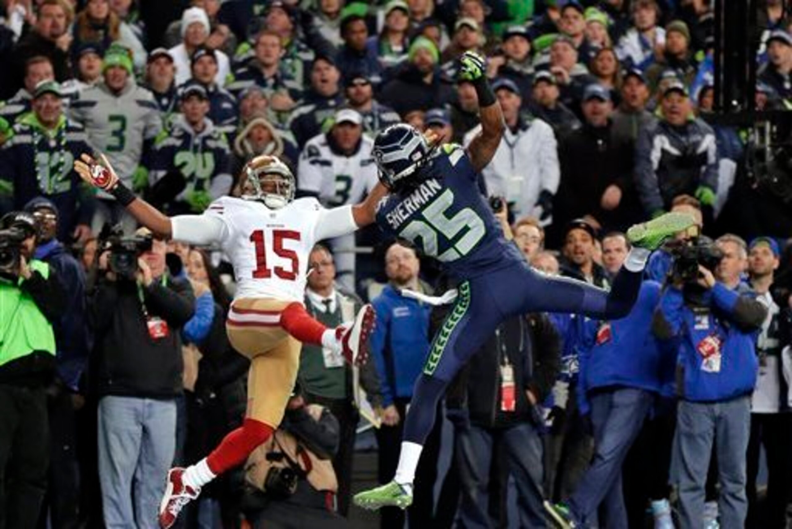 The play that will live on in infamy—Richard Sherman deflects a pass away from Michael Crabtree in the Seattle Seahawks' win in the NFC Championship Game last season. The play that will live on in infamy—Richard Sherman deflects a pass away from Michael Crabtree in the Seattle Seahawks' win in the NFC Championship Game last season.