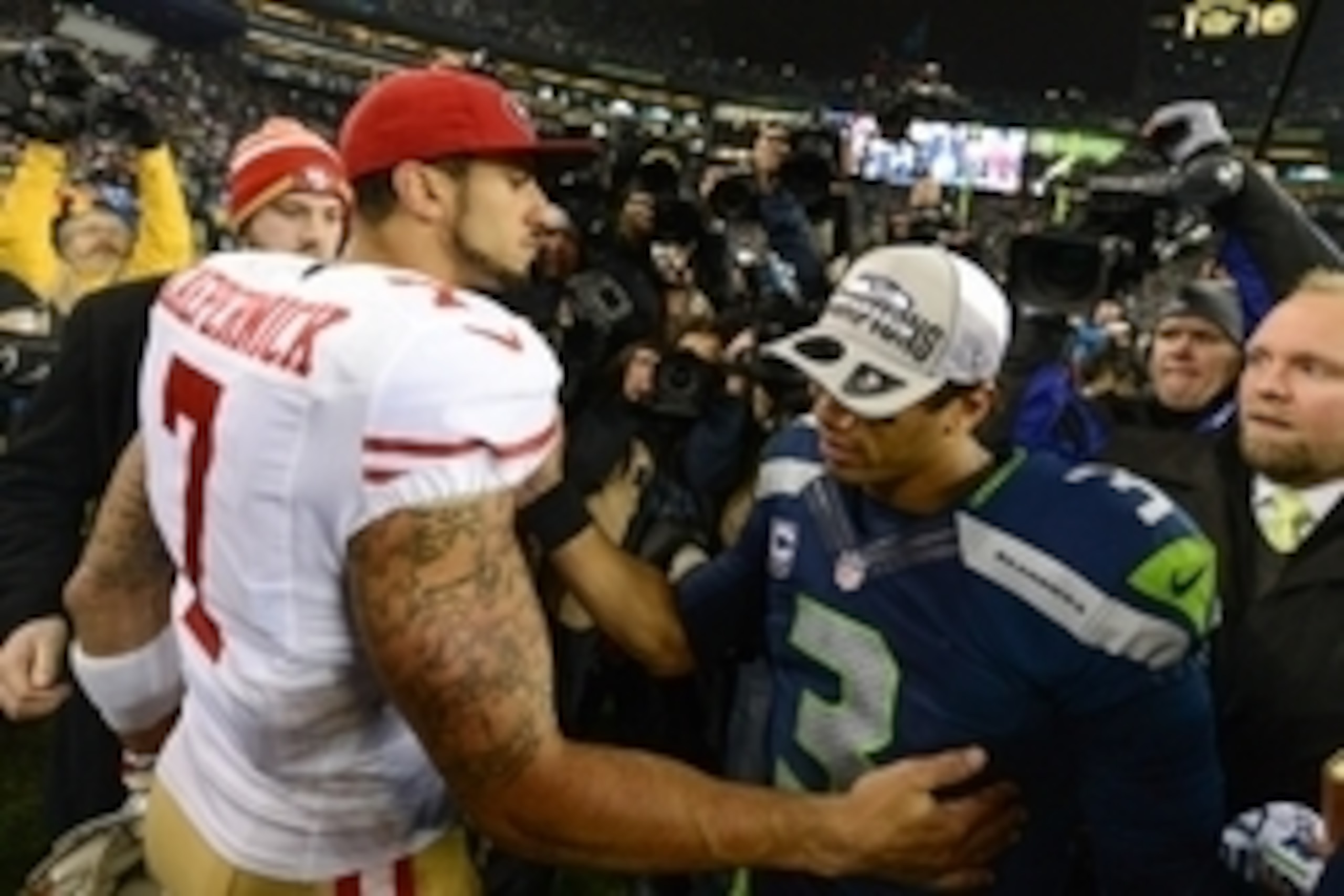 Jan 19, 2014; Seattle, WA, USA; San Francisco 49ers quarterback Colin Kaepernick (7) congratulates Seattle Seahawks quarterback Russell Wilson (3) after the 2013 NFC Championship football game at CenturyLink Field. The Seahawks defeated the 49ers 23-17. M Jan 19, 2014; Seattle, WA, USA; San Francisco 49ers quarterback Colin Kaepernick (7) congratulates Seattle Seahawks quarterback Russell Wilson (3) after the 2013 NFC Championship football game at CenturyLink Field. The Seahawks defeated the 49ers 23-17. M