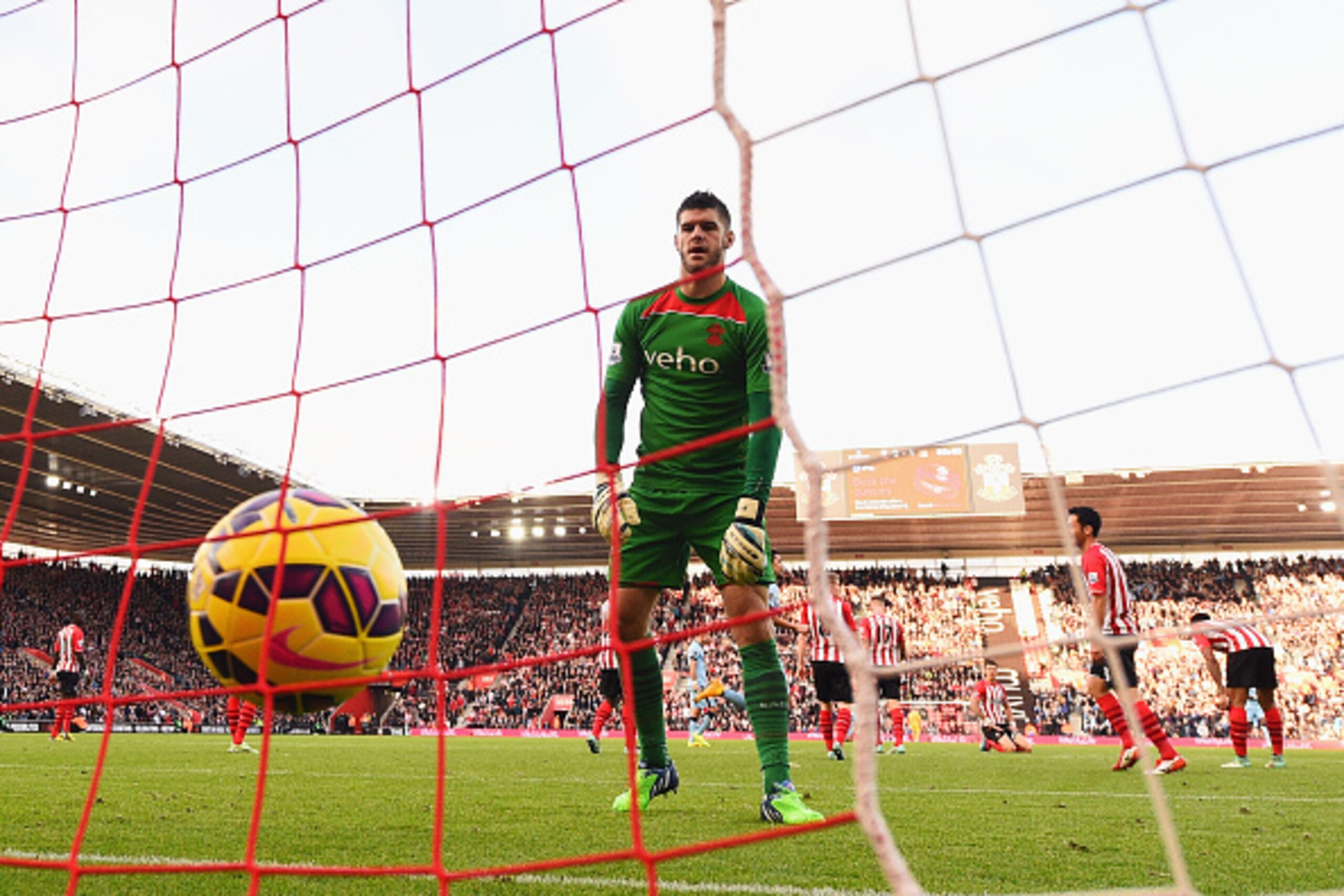 SOUTHAMPTON, ENGLAND - NOVEMBER 30: Goalkeeper Fraser Forster of Southampton reacts after conceding a goal during the Barclays Premier League match between Southampton and Manchester City at St Mary's Stadium on November 30, 2014 in Southampton, England. SOUTHAMPTON, ENGLAND - NOVEMBER 30: Goalkeeper Fraser Forster of Southampton reacts after conceding a goal during the Barclays Premier League match between Southampton and Manchester City at St Mary's Stadium on November 30, 2014 in Southampton, England.