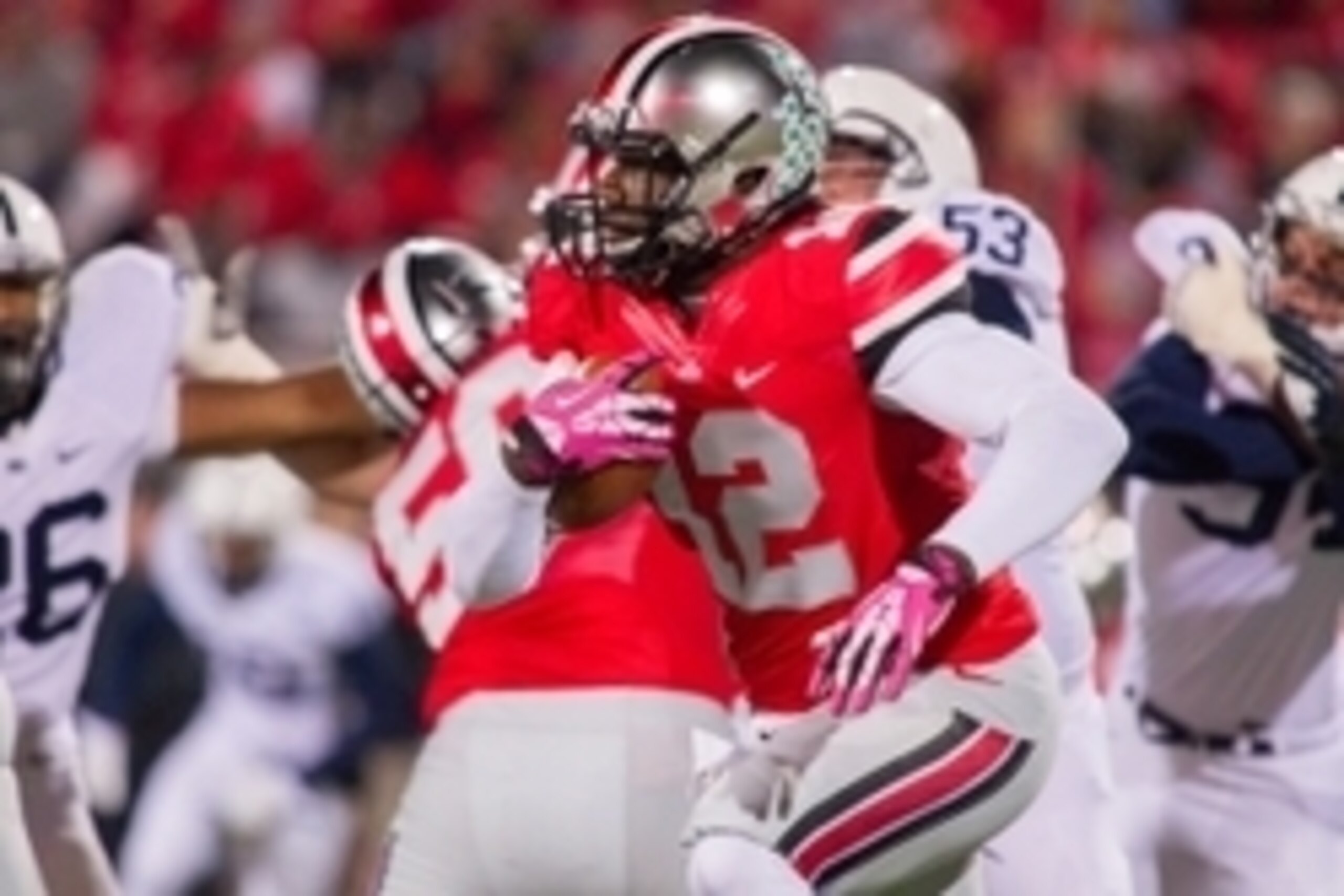 Oct 26, 2013; Columbus, OH, USA;  Ohio State Buckeyes quarterback Cardale Jones (12) runs the ball in the game against the Penn State Nittany Lions at Ohio Stadium. The Ohio State Buckeyes beat the Penn State Nittany Lions 63-14. Mandatory Credit: Trevor 