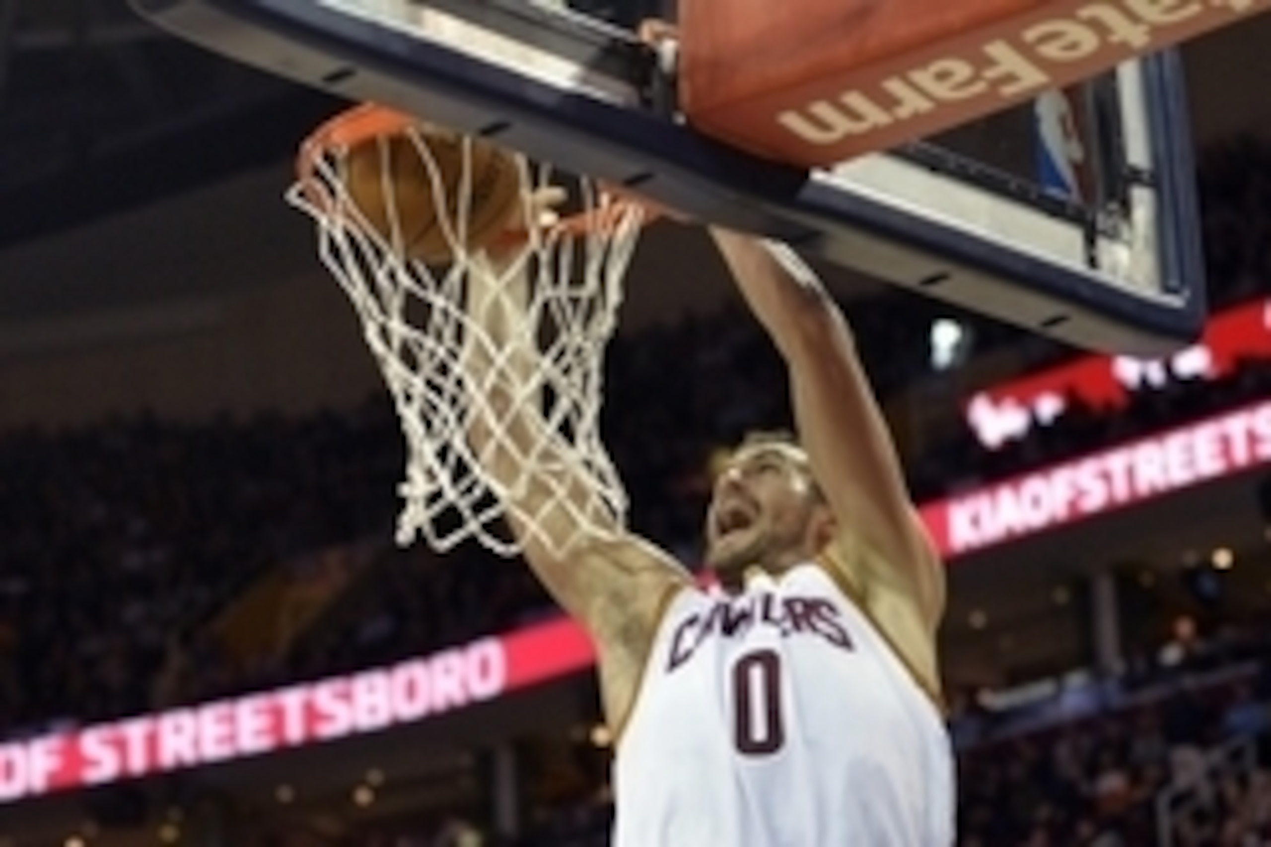 Nov 24, 2014; Cleveland, OH, USA; Cleveland Cavaliers forward Kevin Love (0) dunks in the third quarter against the Orlando Magic at Quicken Loans Arena. Mandatory Credit: David Richard-USA TODAY Sports