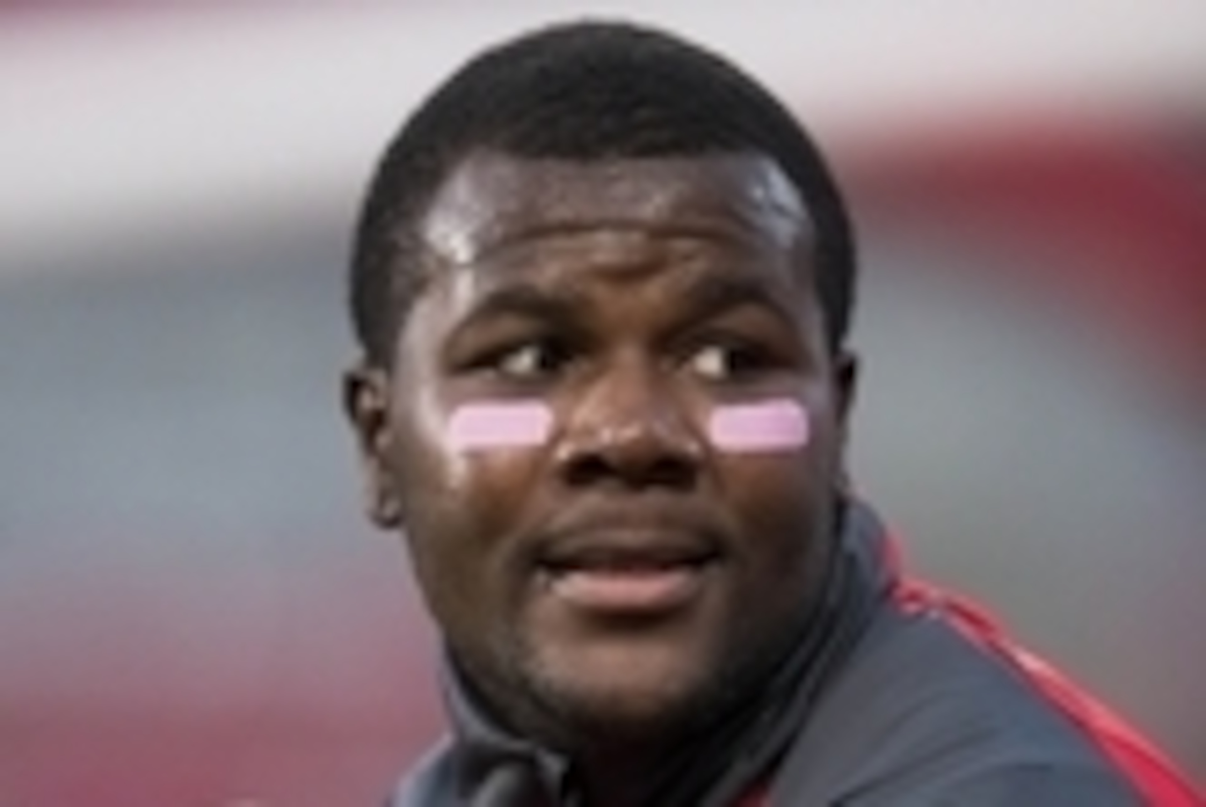 Oct 26, 2013; Columbus, OH, USA; Ohio State Buckeyes quarterback Cardale Jones (12) wears pink reflection blockers for breast cancer awareness before the game against the Penn State Nittany Lions at Ohio Stadium. Mandatory Credit: Greg Bartram-USA TODAY S